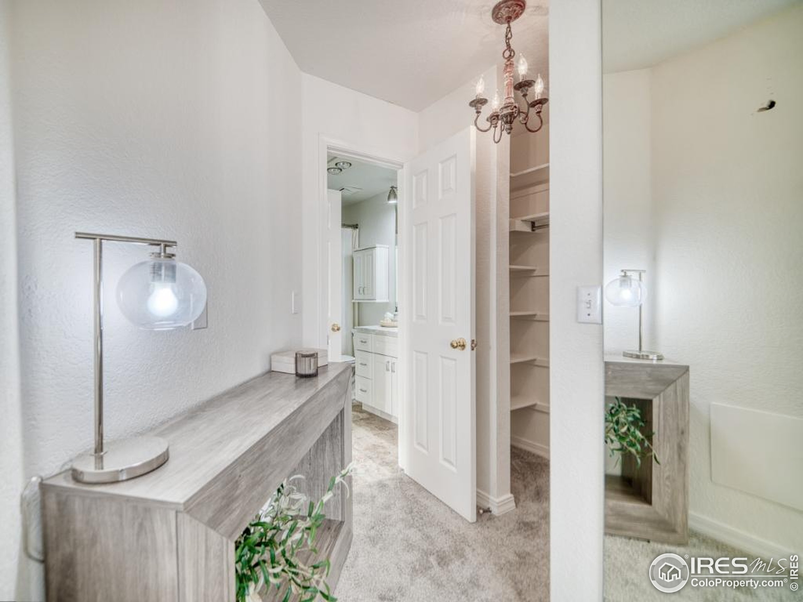 5174 Buckingham Road Boulder, CO 80301 - Photo 13 of 29 a spacious bathroom with a granite countertop sink a mirror and shower