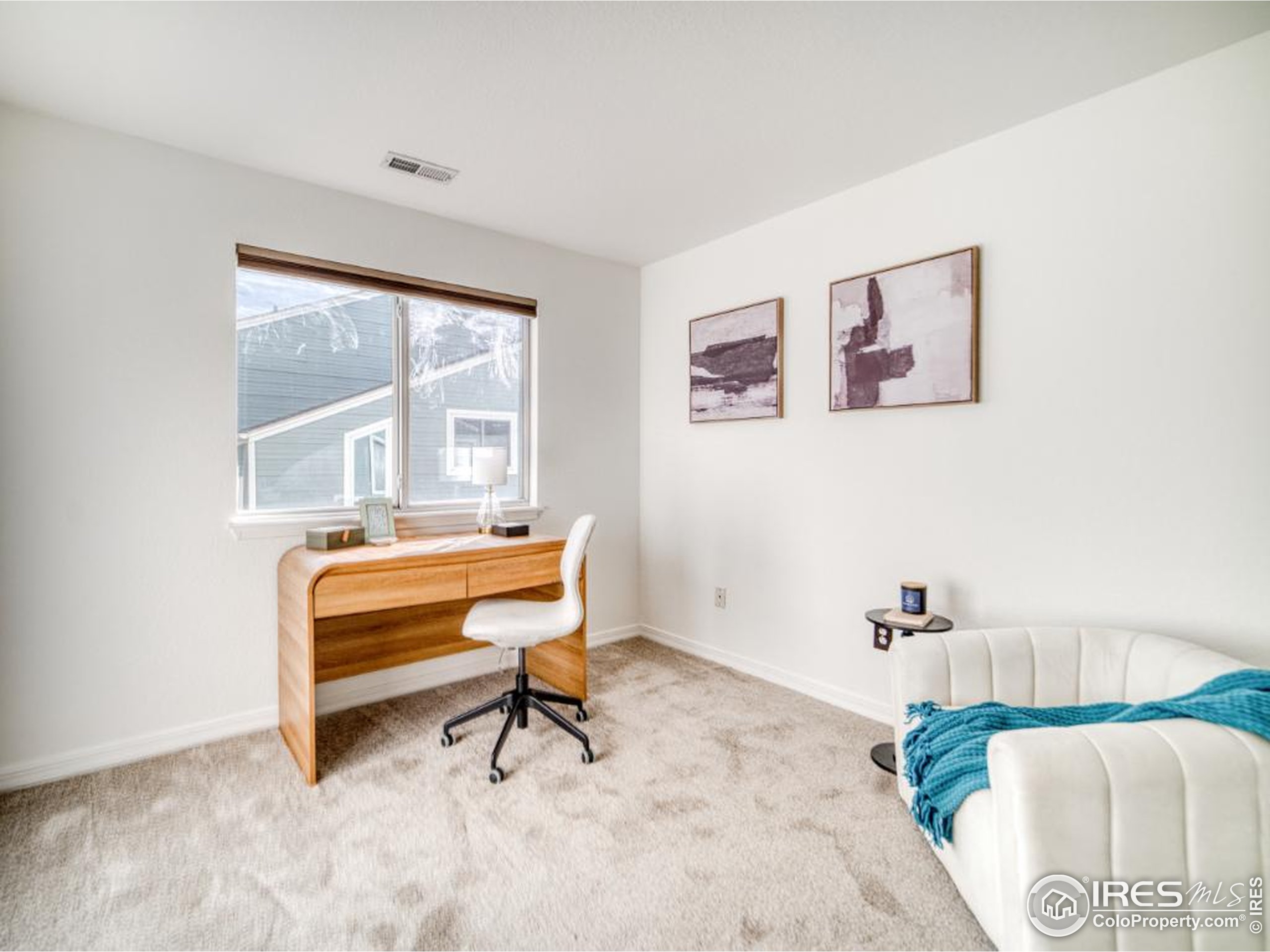 5174 Buckingham Road Boulder, CO 80301 - Photo 15 of 29 a living room with furniture and a window