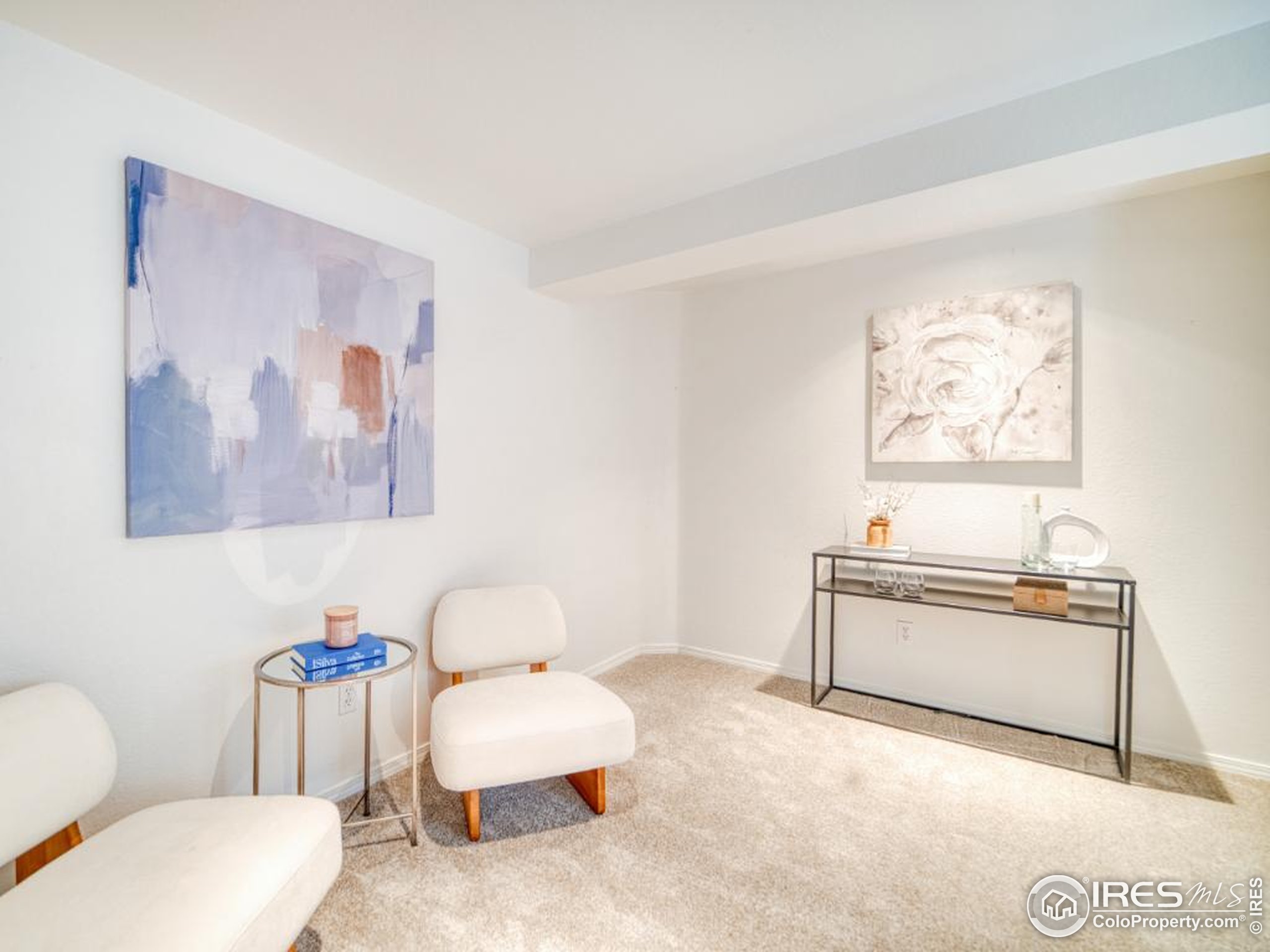 5174 Buckingham Road Boulder, CO 80301 - Photo 18 of 29 a living room with furniture a couch and a potted plant