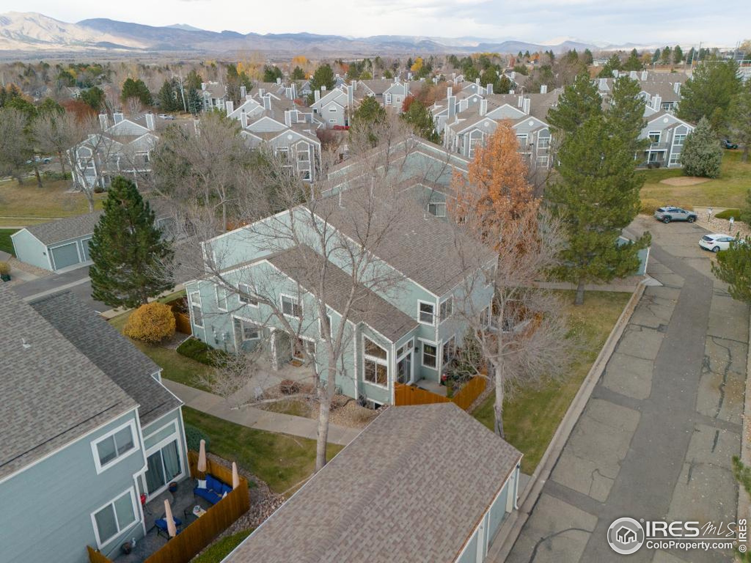 5174 Buckingham Road Boulder, CO 80301 - Photo 24 of 29 an aerial view of a house with a mountain