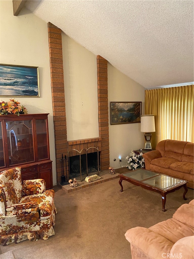 3177 Hawkwood Road Diamond Bar, CA 91765 - Photo 11 of 21 a living room with furniture window and fireplace