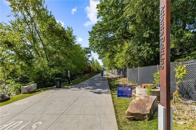 a view of a brick building with many windows