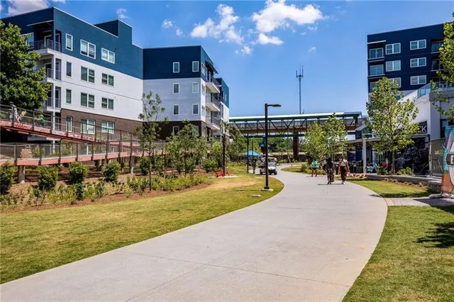 a view of a building with sitting area