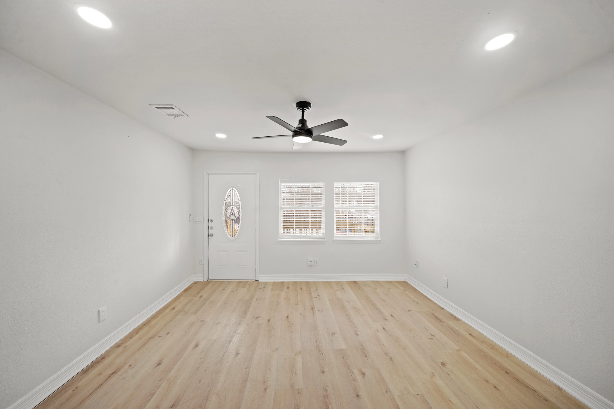 3501 Farmer Street Houston, TX 77020 - Photo 26 of 27 wooden floor in an empty room with a window