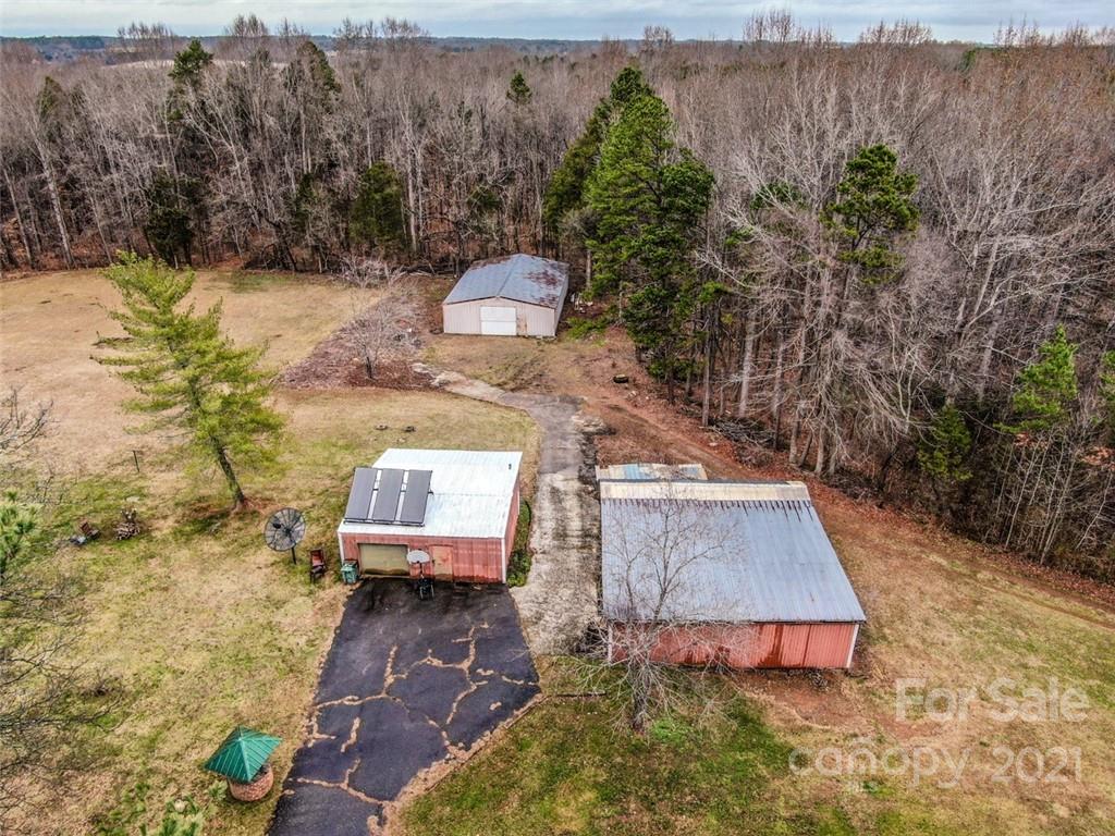 255 Rock Hump Road Salisbury, NC 28147 - Photo 13 of 39 a view of a yard with chairs
