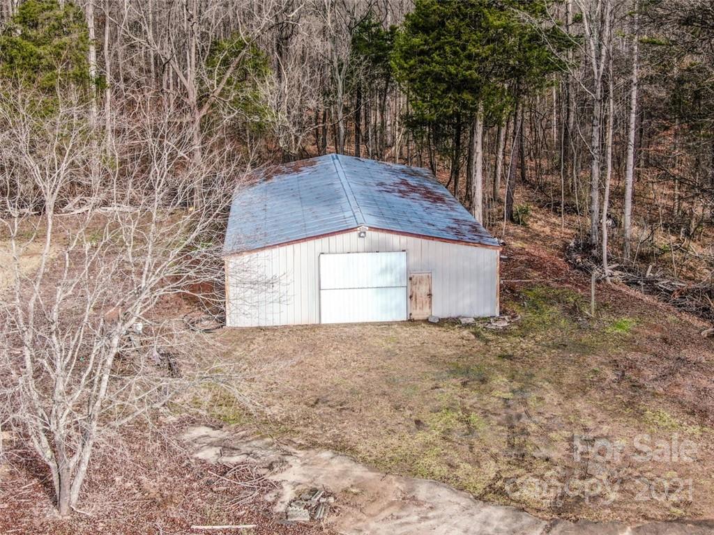 255 Rock Hump Road Salisbury, NC 28147 - Photo 20 of 39 a backyard of a house with lots of green space