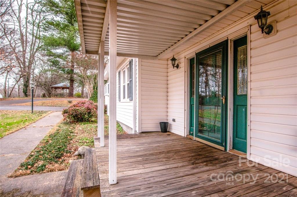 255 Rock Hump Road Salisbury, NC 28147 - Photo 4 of 39 a view of a backyard with a patio