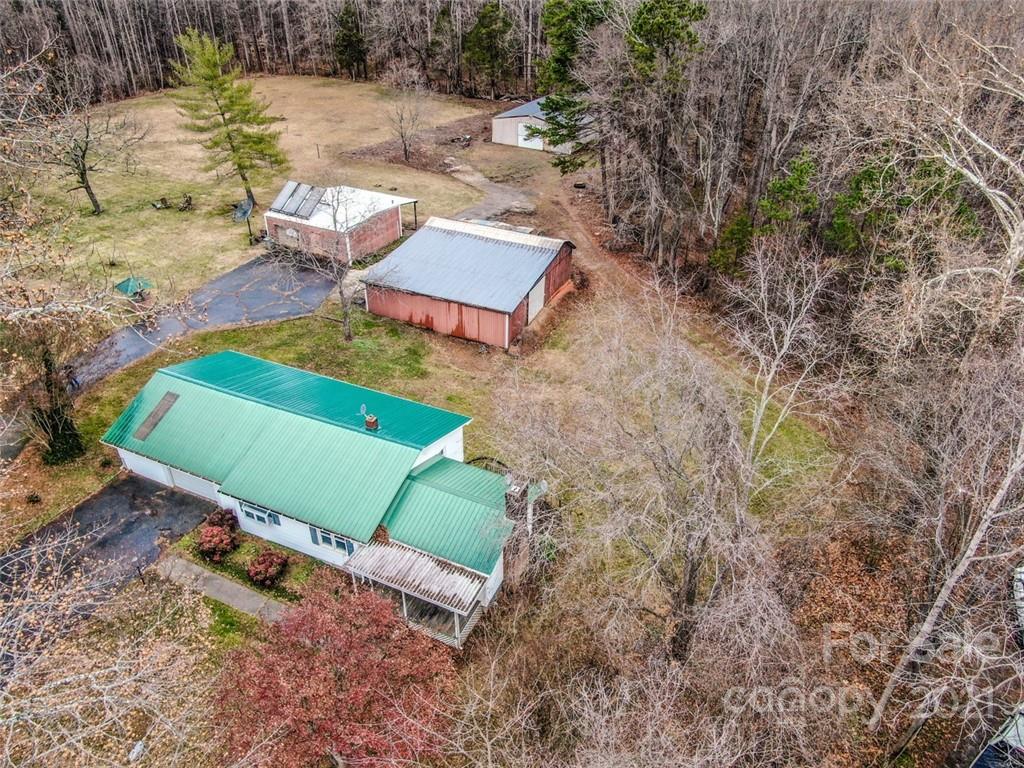 255 Rock Hump Road Salisbury, NC 28147 - Photo 8 of 39 an aerial view of a house with a yard and lake view