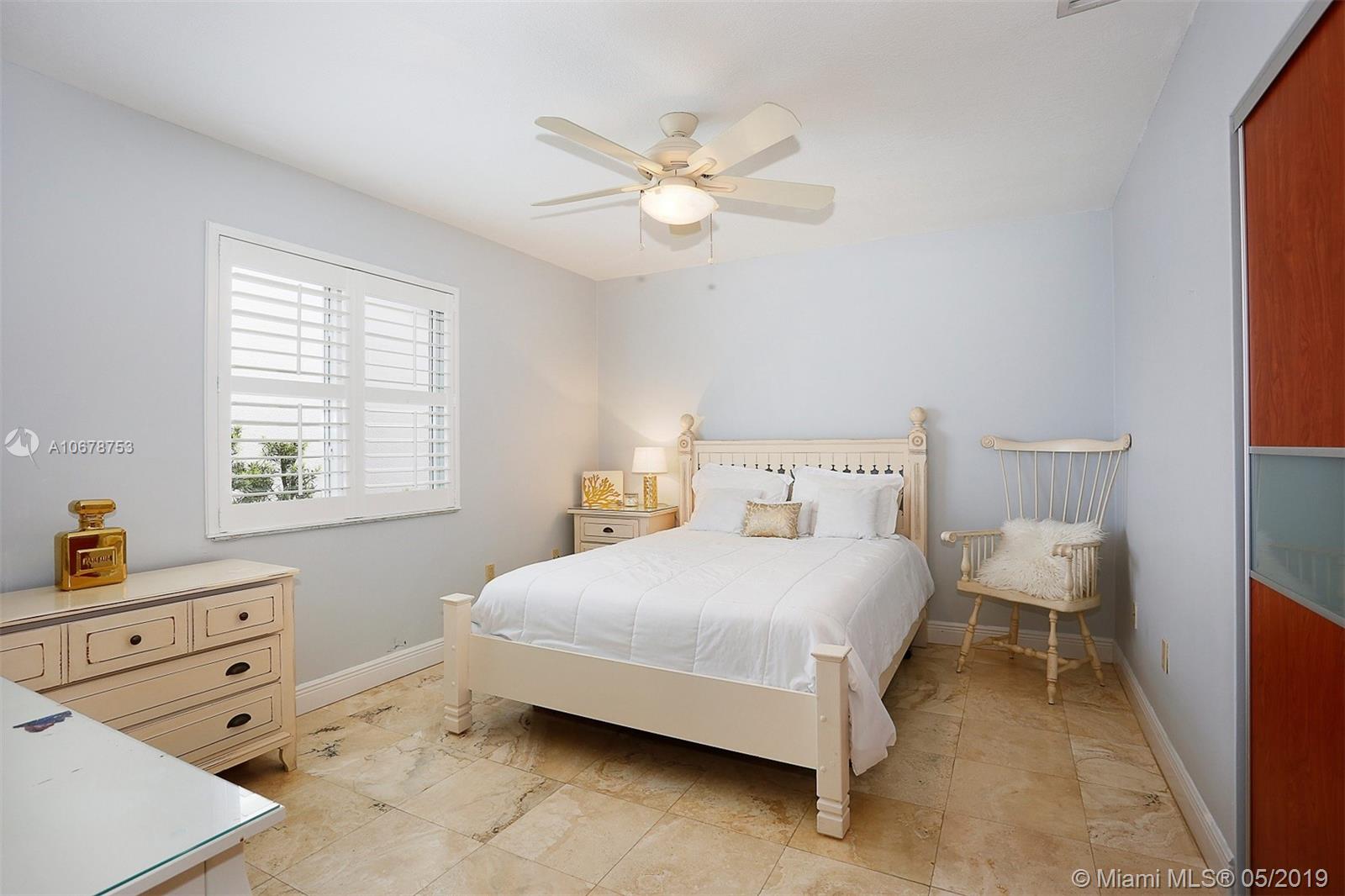 5939 Southwest 34th Street Miami, FL 33155 - Photo 18 of 30 2nd Bedroom with custom step-in closet.