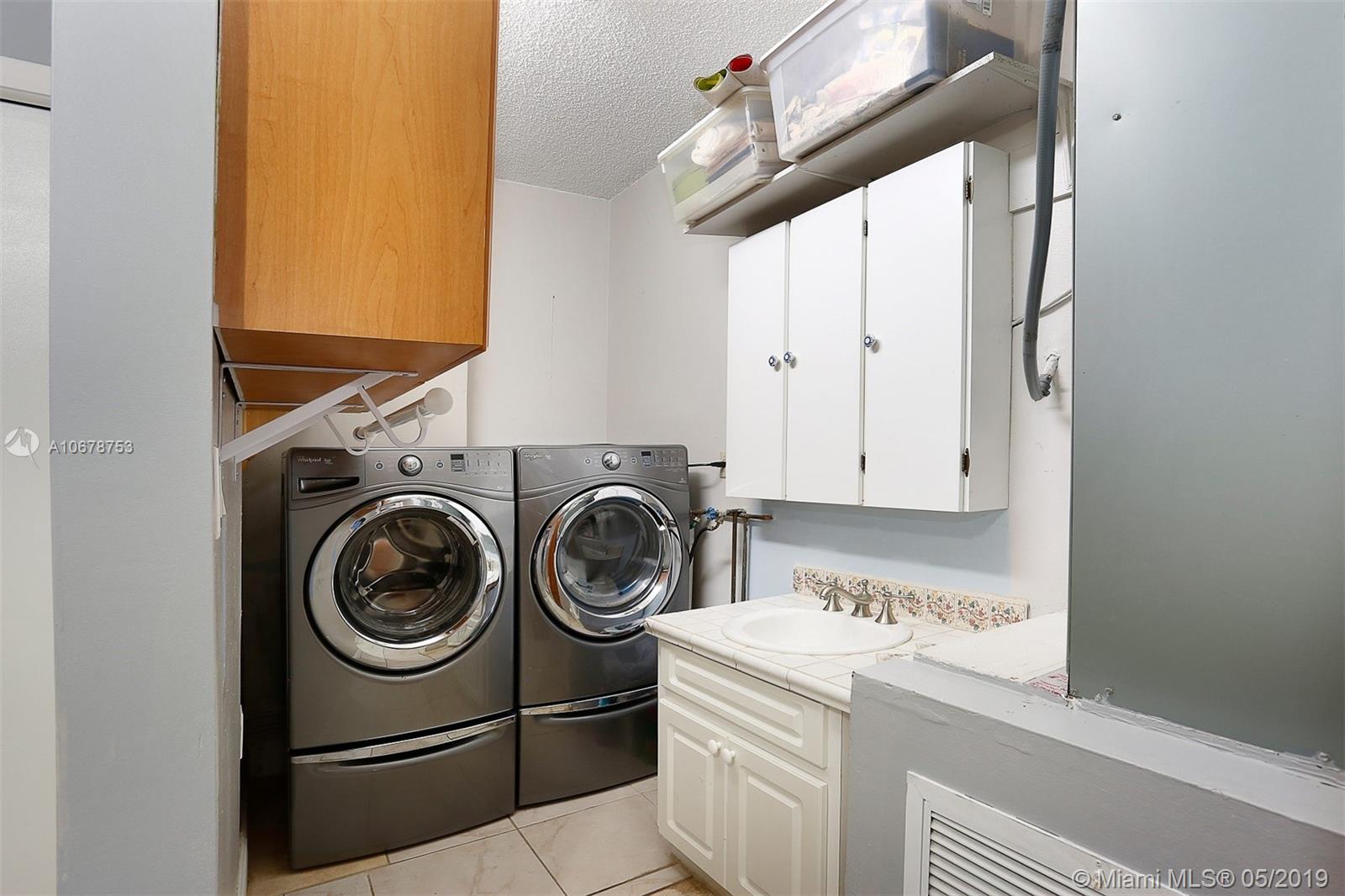 5939 Southwest 34th Street Miami, FL 33155 - Photo 23 of 30 Full size washer/dryer and laundry tub!
