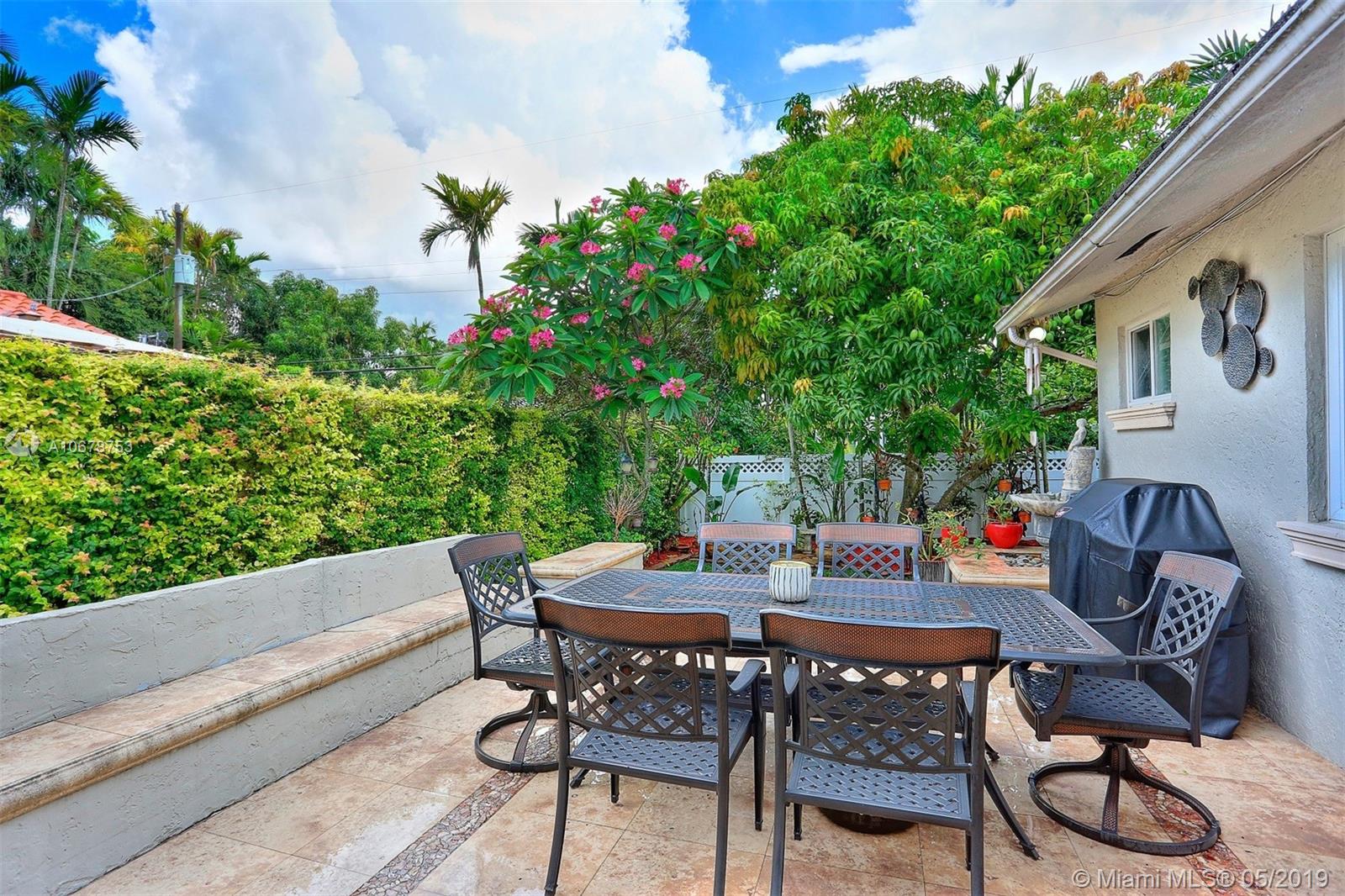 5939 Southwest 34th Street Miami, FL 33155 - Photo 25 of 30 Outdoor courtyard perfect for breakfast at sunrise, bbq'ing with friends or relaxing over a bottle of wine in the evenings.