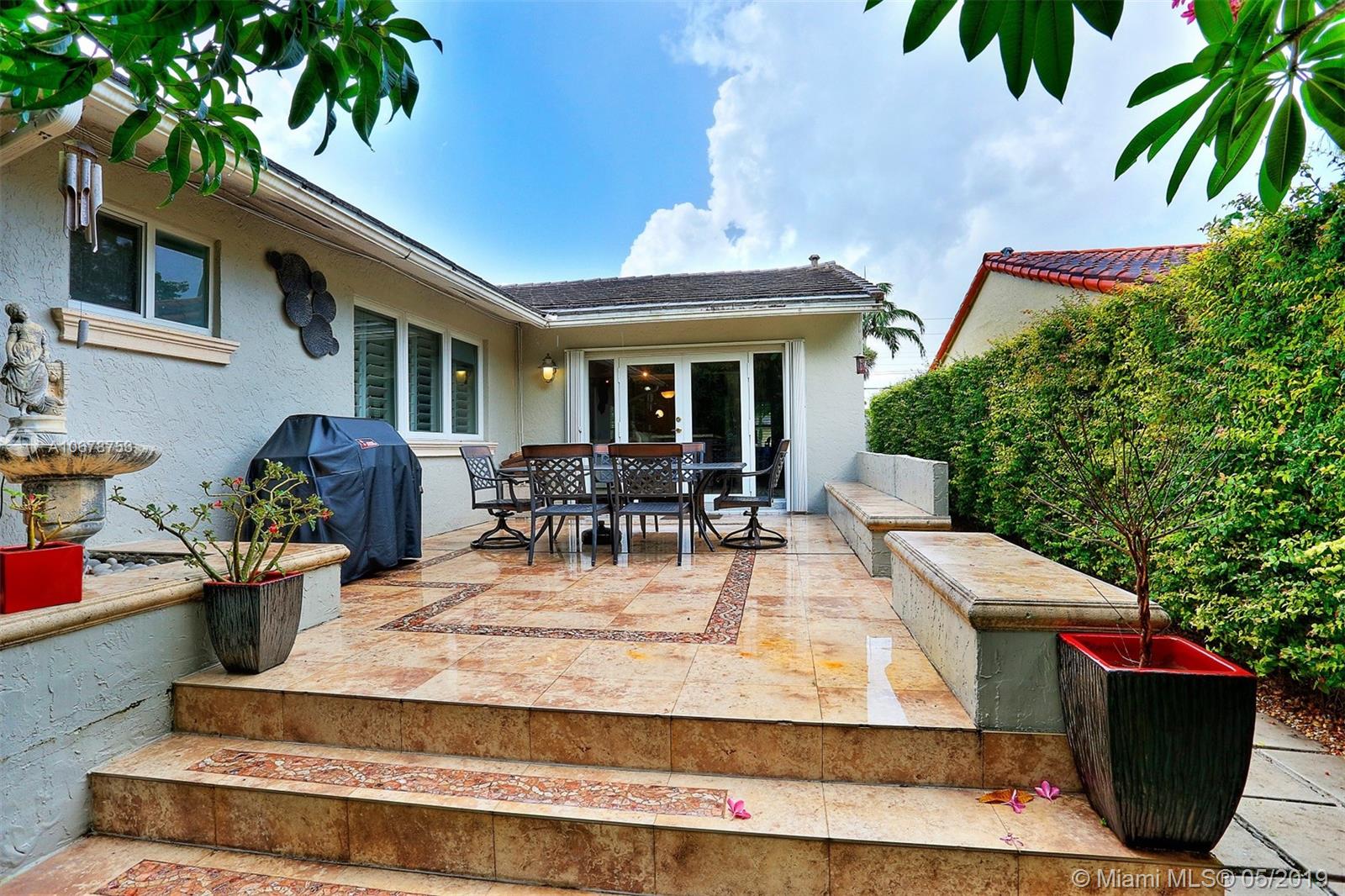 5939 Southwest 34th Street Miami, FL 33155 - Photo 26 of 30 Outdoor courtyard perfect for breakfast at sunrise, bbq'ing with friends or relaxing over a bottle of wine in the evenings.