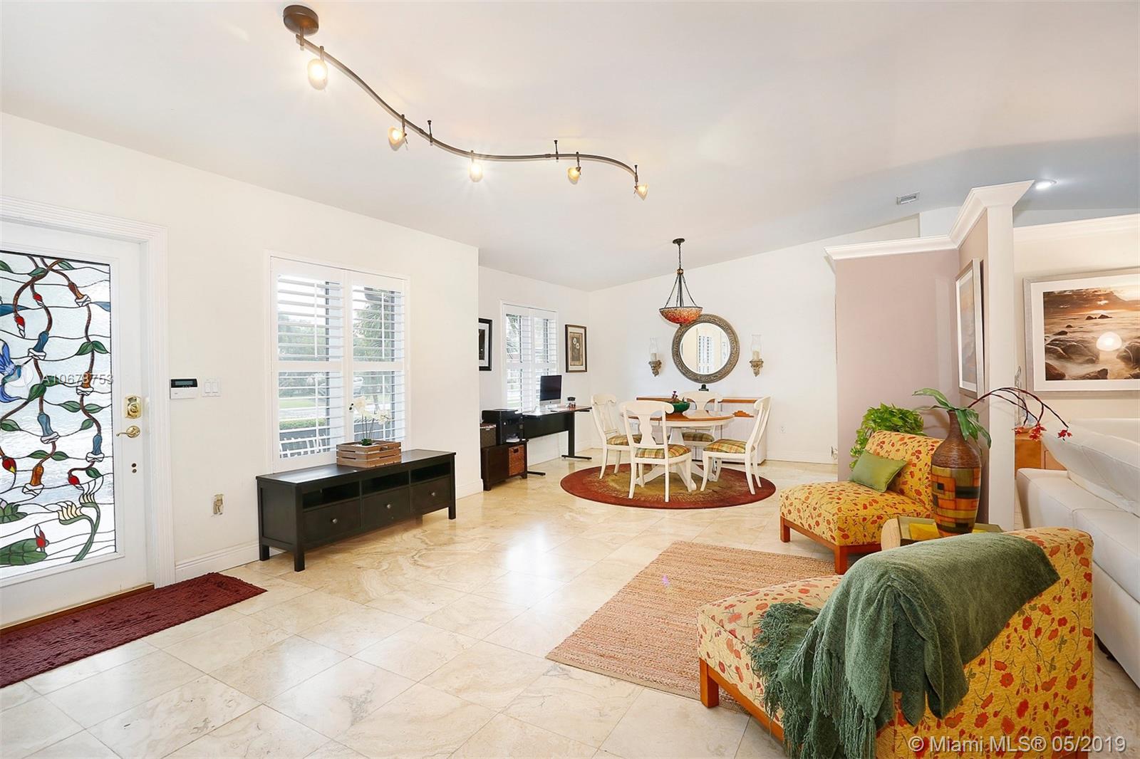 5939 Southwest 34th Street Miami, FL 33155 - Photo 3 of 30 You'll love the bright open spaces made possible by the vaulted ceilings and large window openings that allow for plentiful natural light throughout.