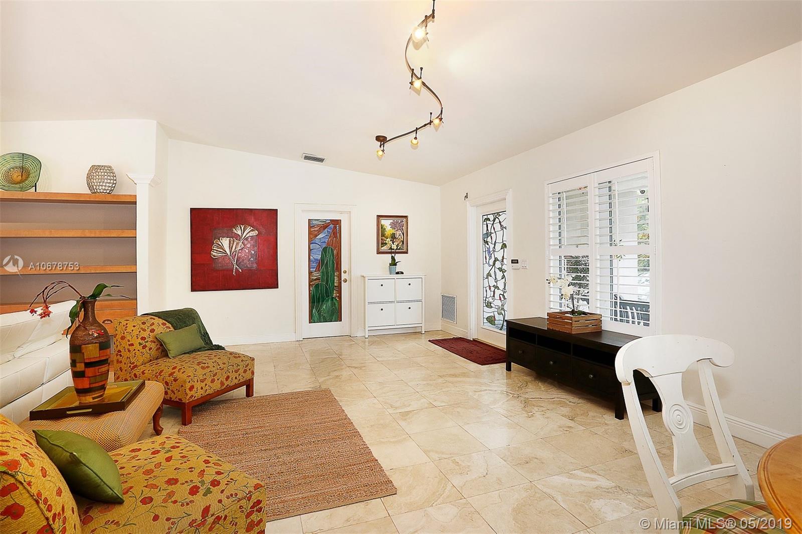 5939 Southwest 34th Street Miami, FL 33155 - Photo 4 of 30 You'll love the bright open spaces made possible by the vaulted ceilings and large window openings that allow for plentiful natural light throughout.