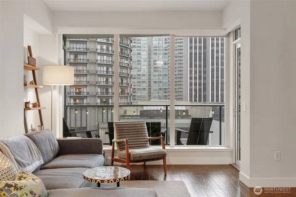 a living room with furniture and a window