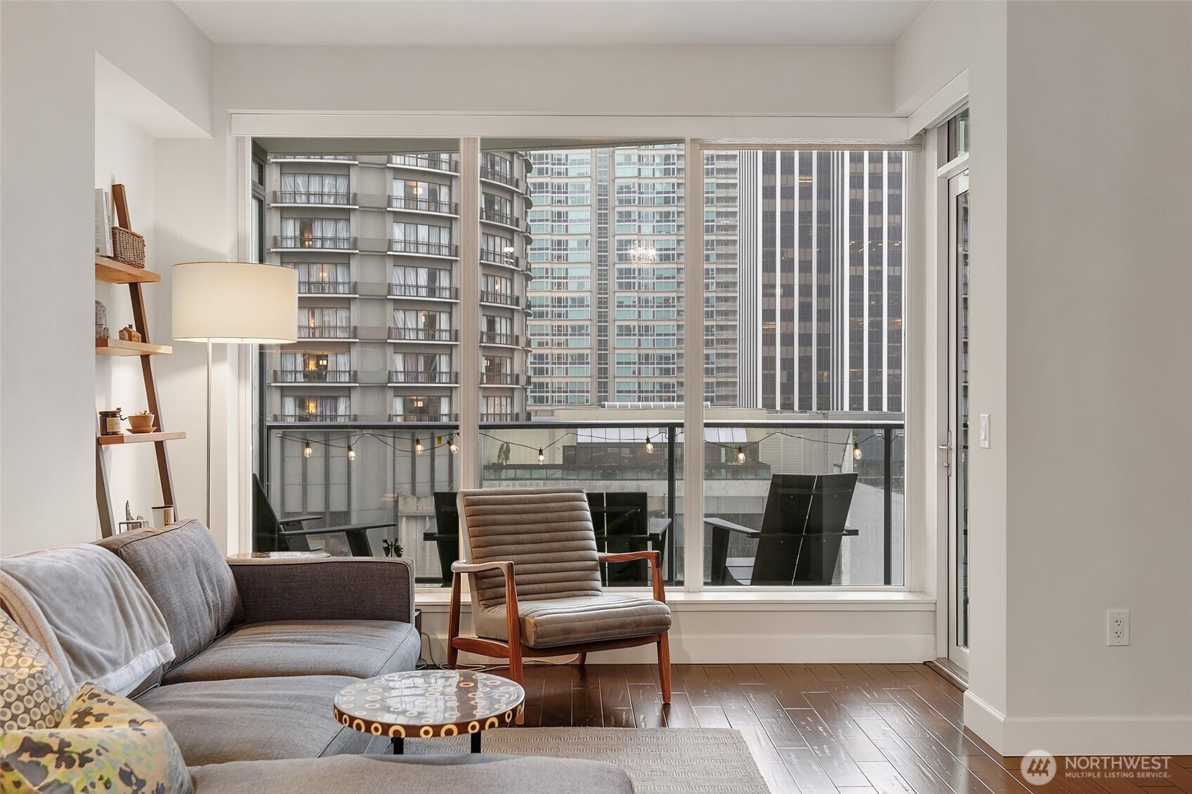 a living room with furniture and a window
