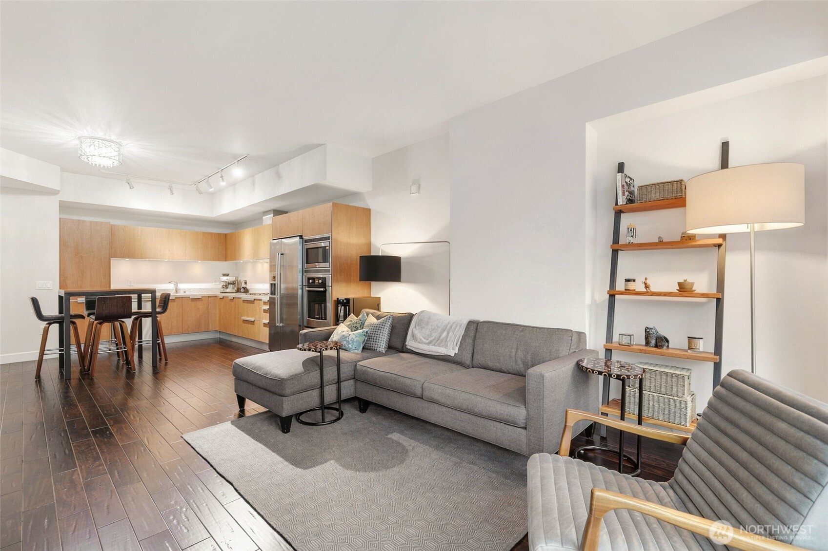 1920 4th Avenue, Unit 509 Seattle, WA 98101 - Photo 11 of 33 a living room with furniture and a table