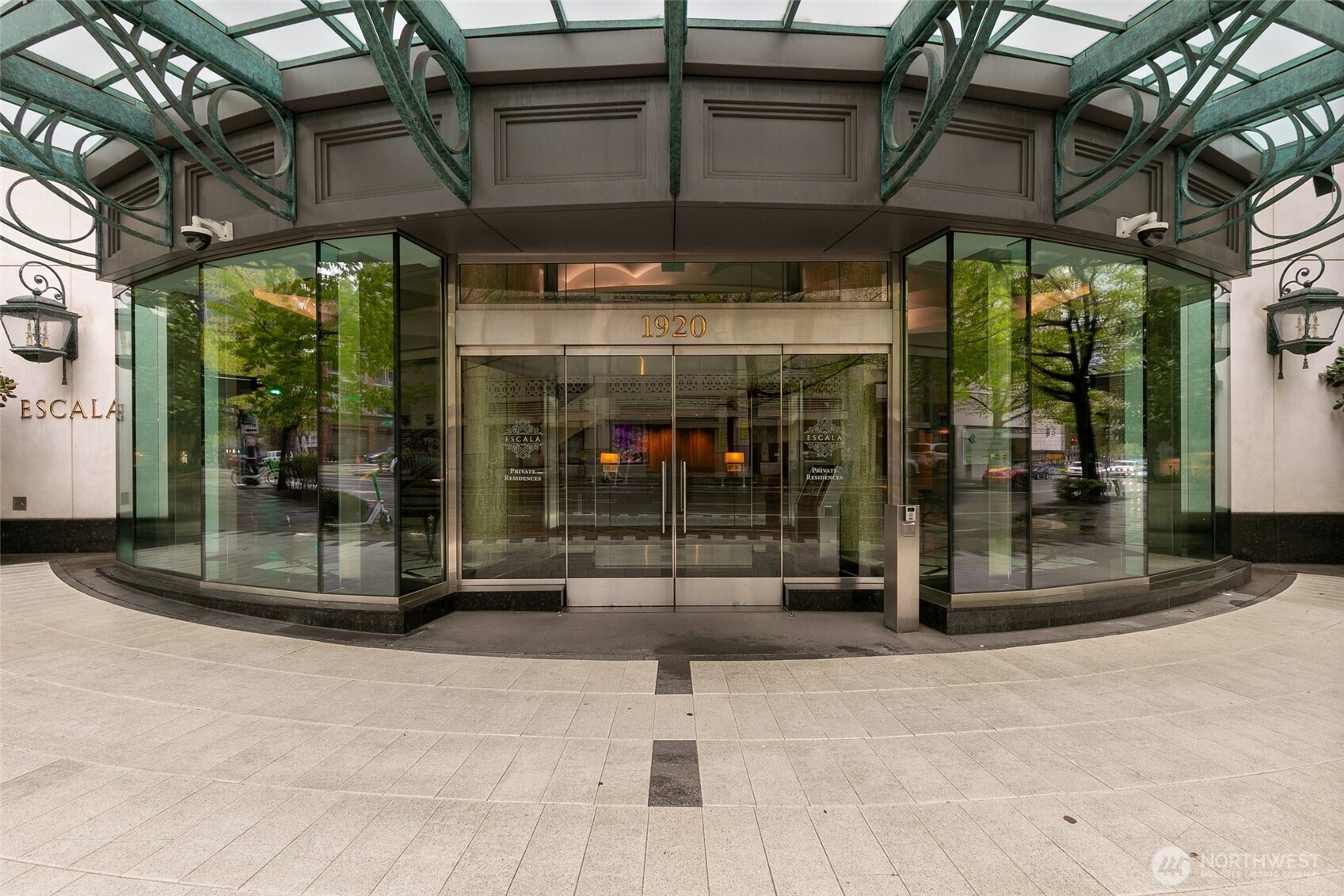 1920 4th Avenue, Unit 509 Seattle, WA 98101 - Photo 19 of 33 a view of a porch with a glass door