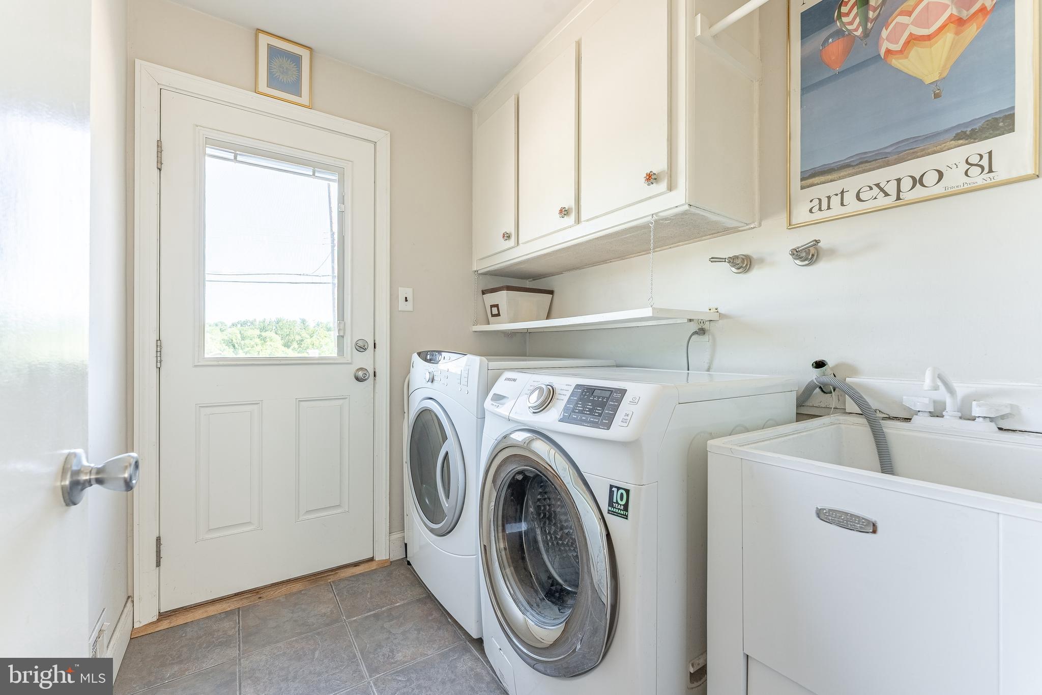 84 North Spring Lane Phoenixville, PA 19460 - Photo 25 of 51 a utility room with dryer and washer