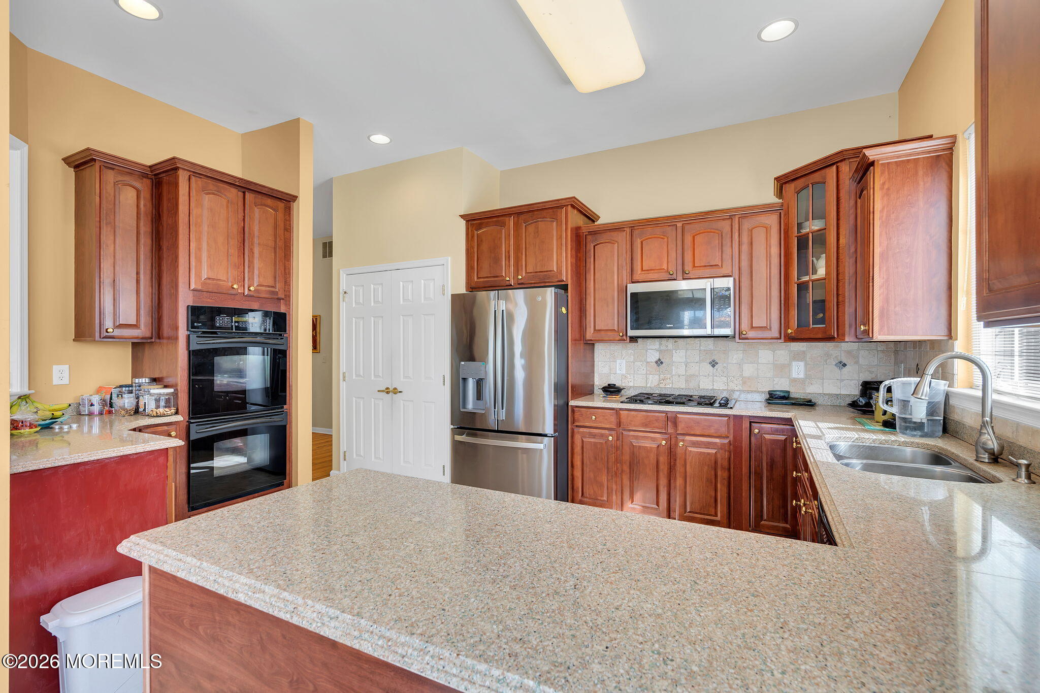 35 Spring Lake Boulevard Waretown, NJ 08758 - Photo 16 of 51 a kitchen with stainless steel appliances granite countertop a refrigerator stove top oven a sink and dishwasher