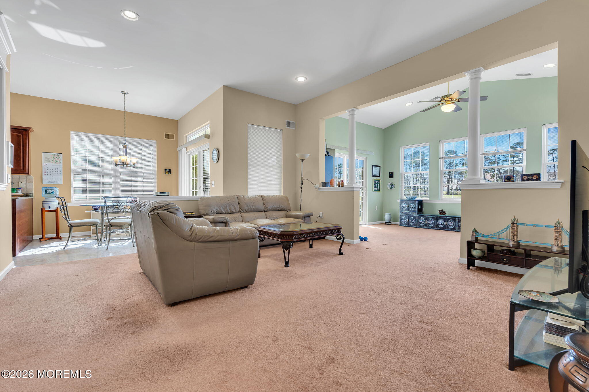 35 Spring Lake Boulevard Waretown, NJ 08758 - Photo 19 of 51 a living room with furniture and a table