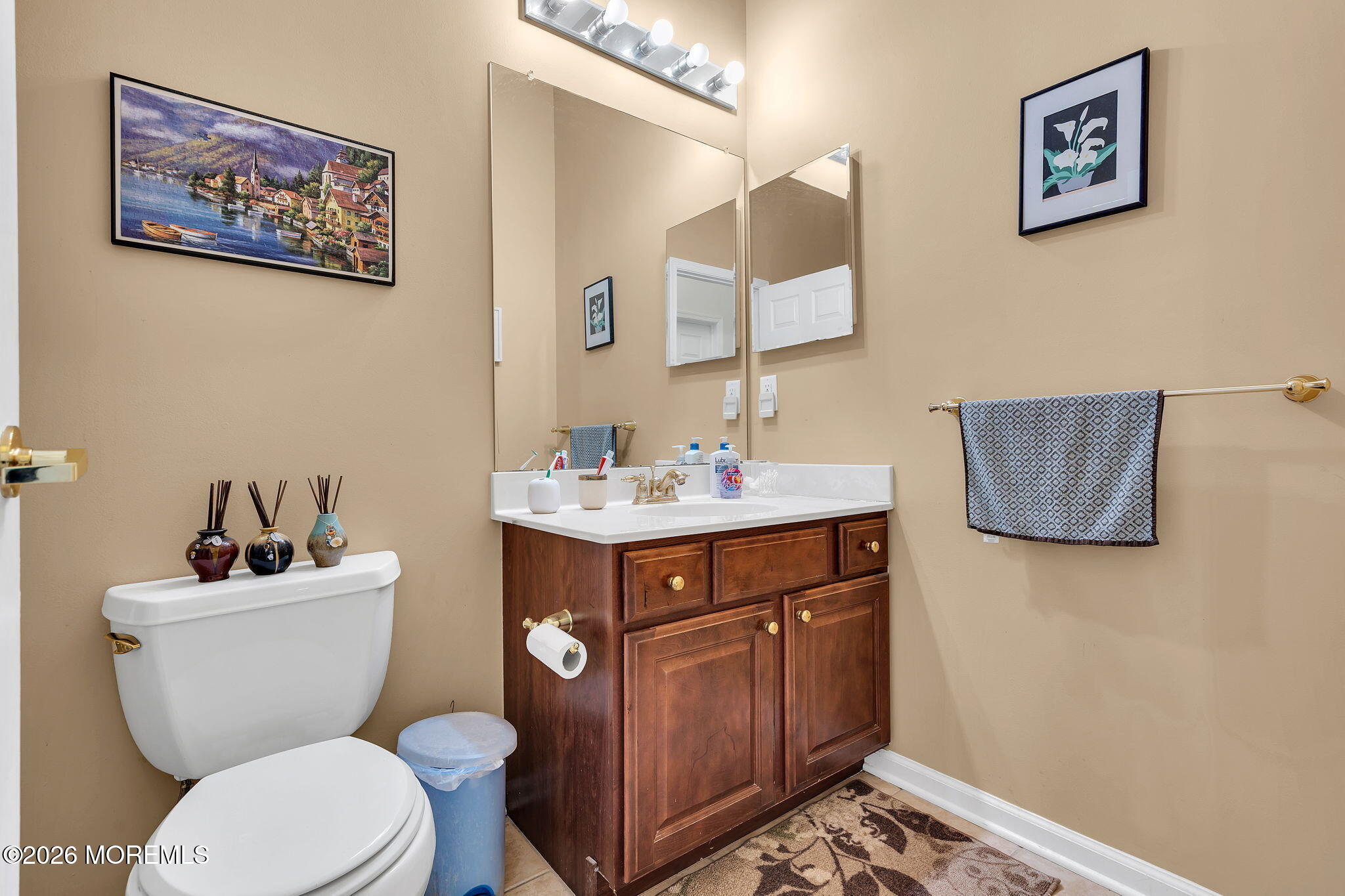 35 Spring Lake Boulevard Waretown, NJ 08758 - Photo 27 of 51 a bathroom with a toilet sink and mirror
