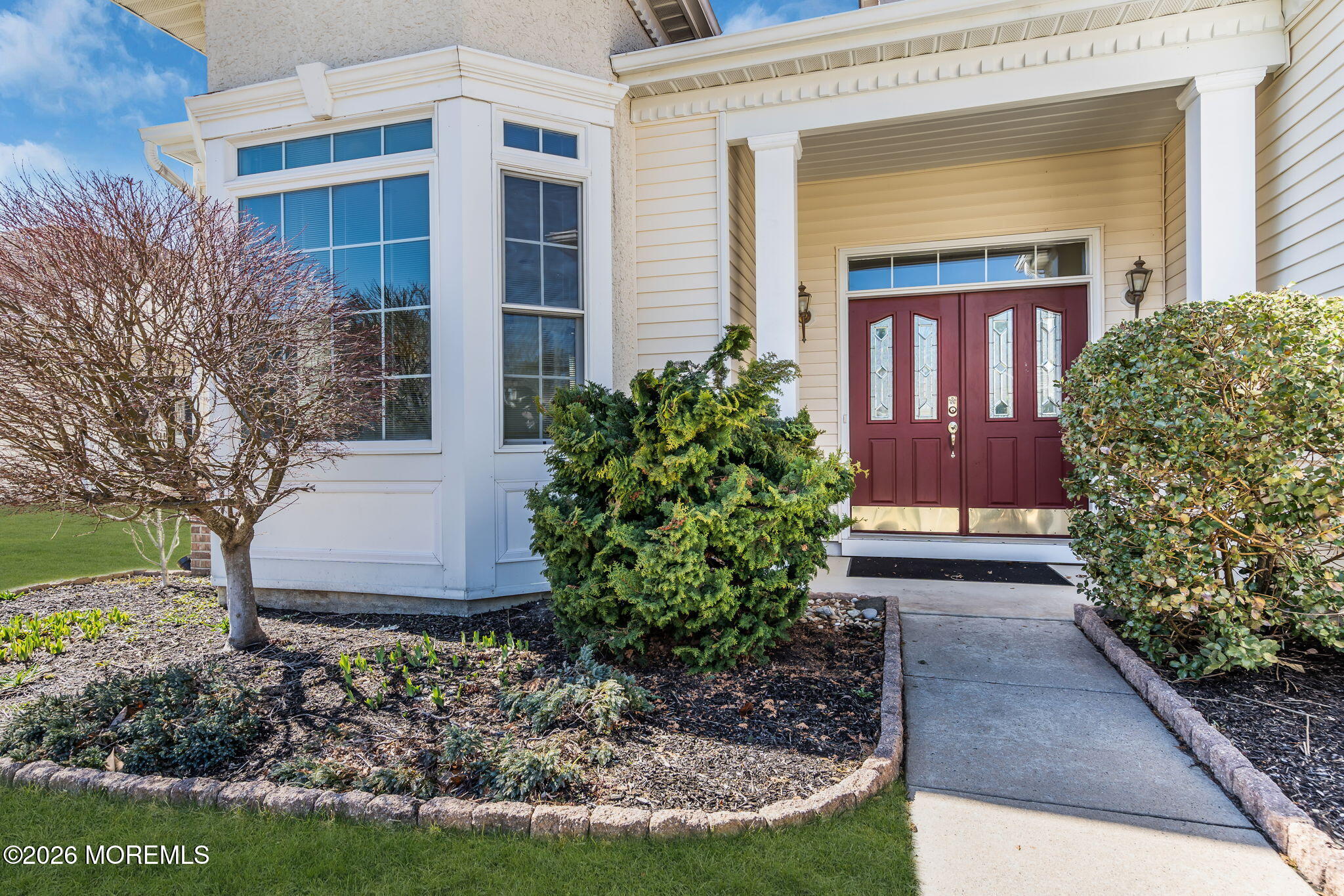35 Spring Lake Boulevard Waretown, NJ 08758 - Photo 3 of 51 a front view of a house with garden