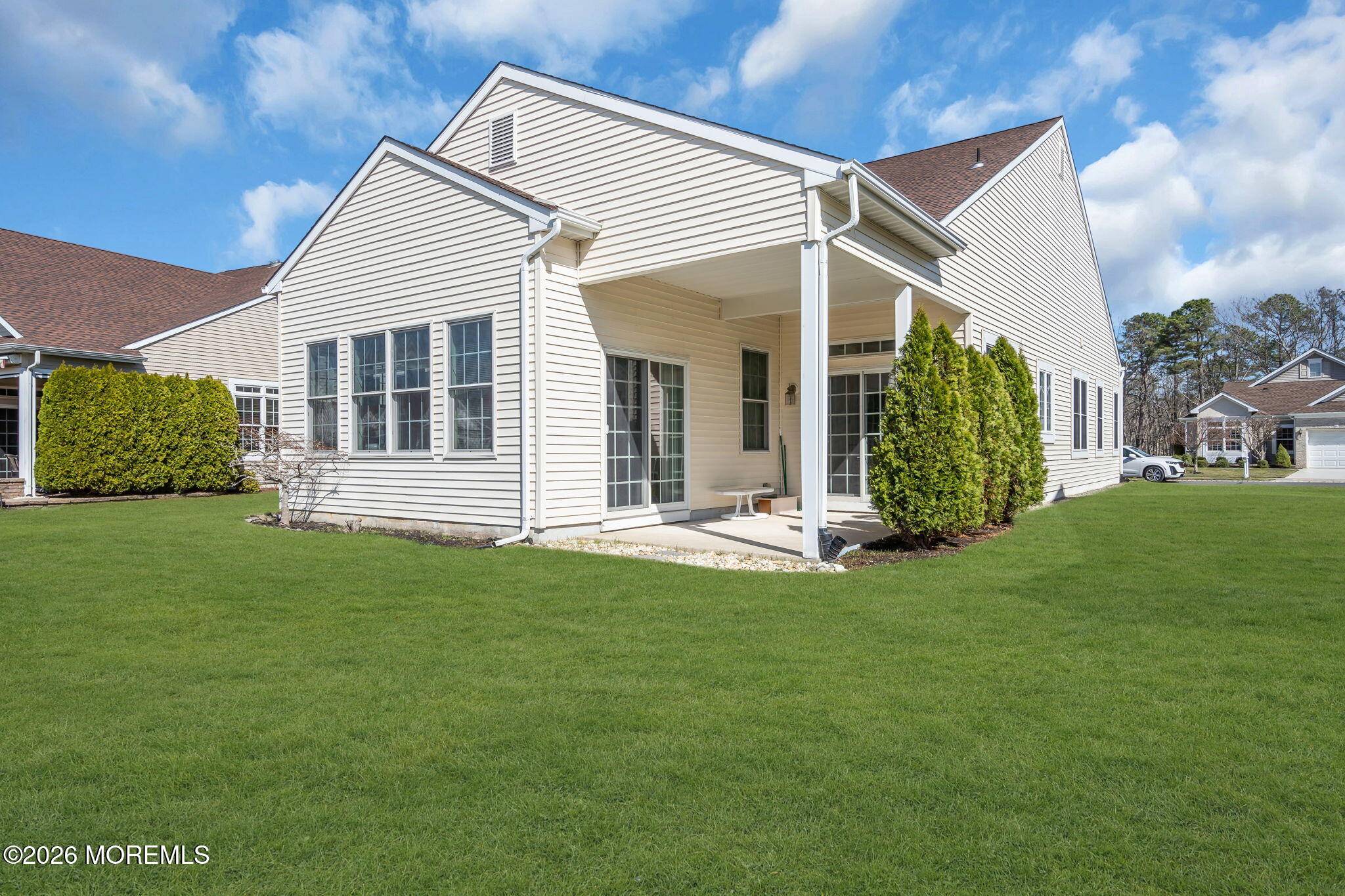 35 Spring Lake Boulevard Waretown, NJ 08758 - Photo 31 of 51 a view of a house with a backyard