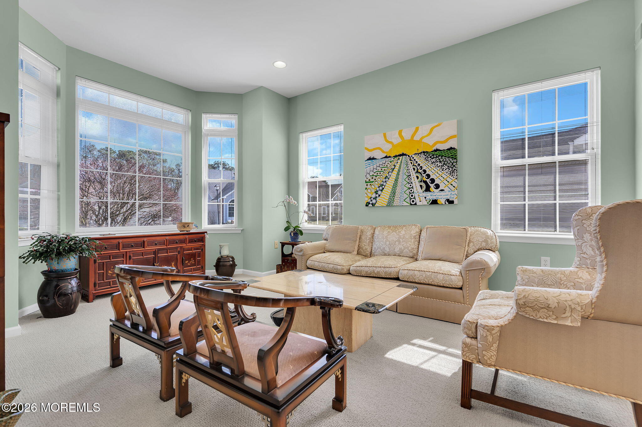 35 Spring Lake Boulevard Waretown, NJ 08758 - Photo 7 of 51 a living room with furniture and a large window