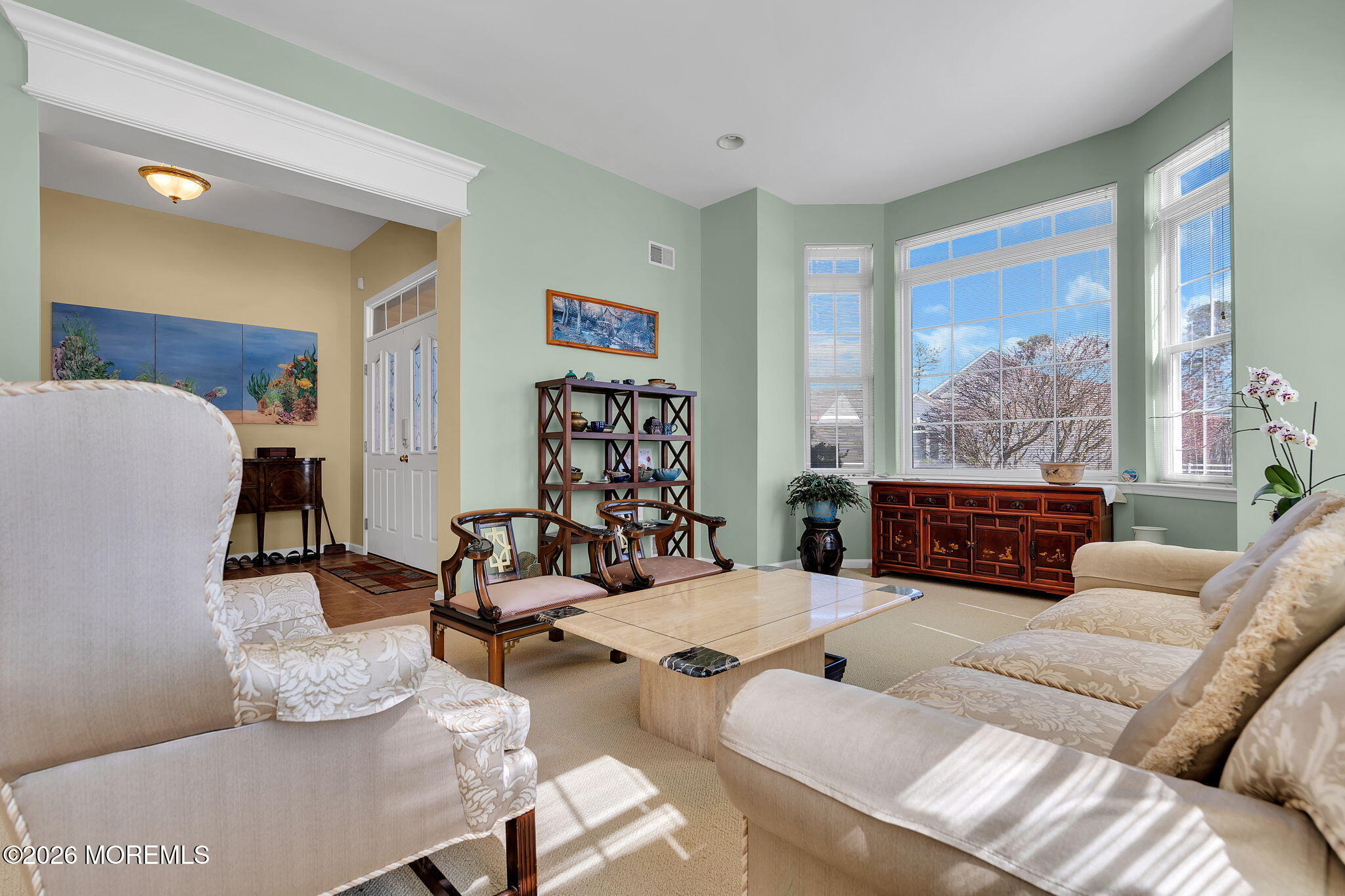 35 Spring Lake Boulevard Waretown, NJ 08758 - Photo 8 of 51 a living room with furniture and a large window
