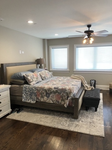 515 Summit Avenue, Unit D Park Ridge, IL 60068 - Photo 7 of 18 a bedroom with a bed and window