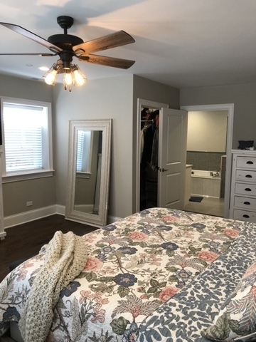 515 Summit Avenue, Unit D Park Ridge, IL 60068 - Photo 8 of 18 a bedroom with a bed and a dresser