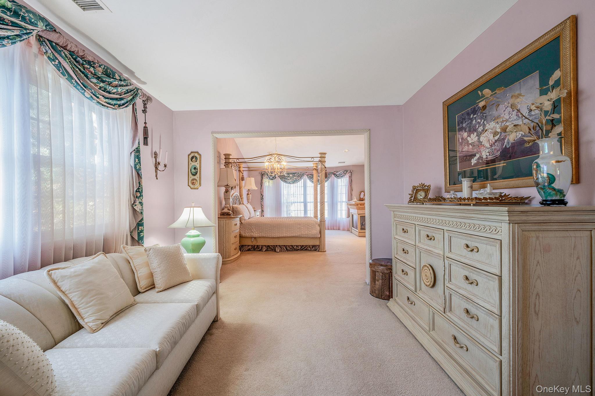 148 Country Club Drive Commack, NY 11725 - Photo 26 of 50 a living room with furniture and a large window