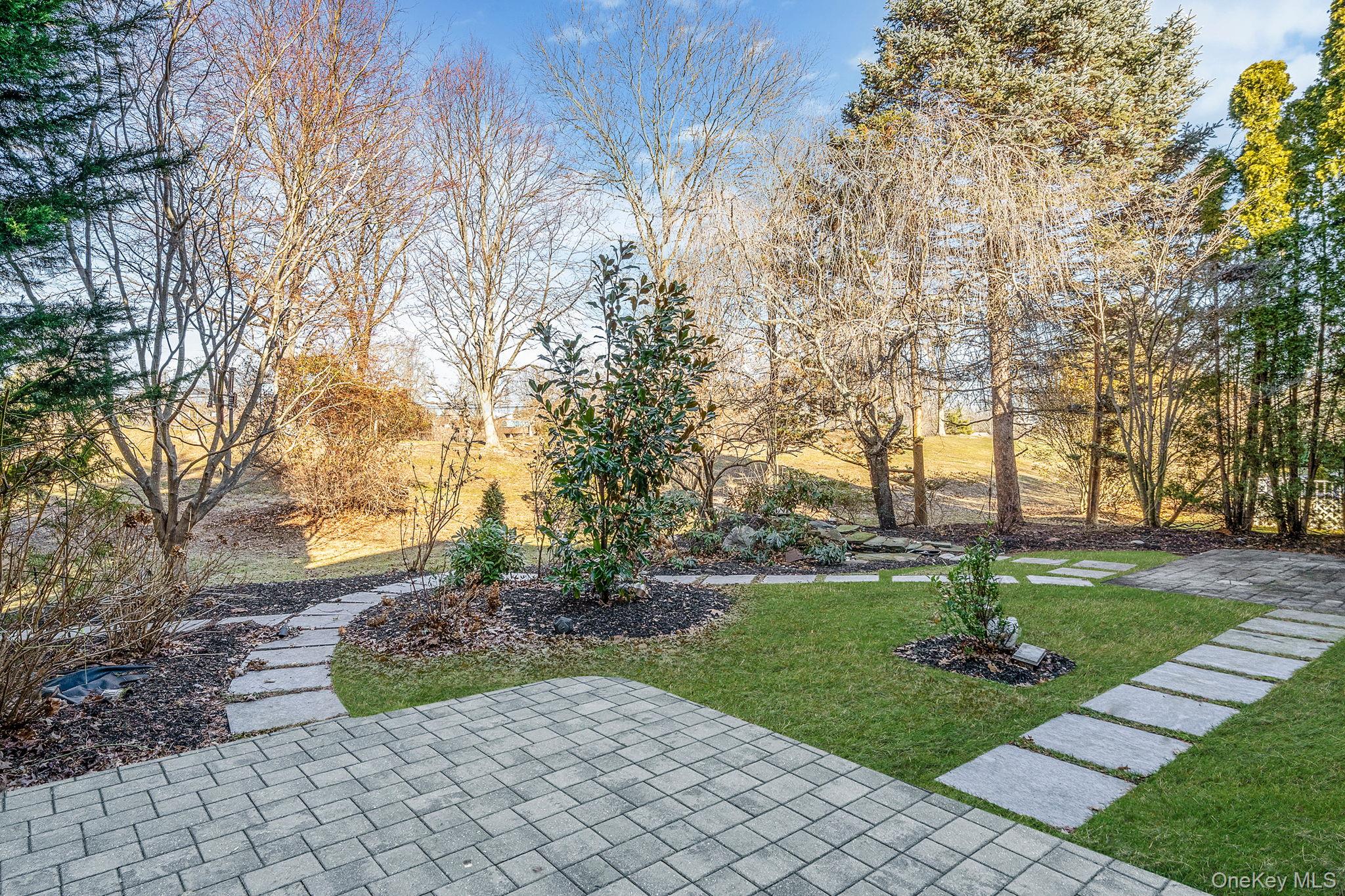 148 Country Club Drive Commack, NY 11725 - Photo 38 of 50 a view of a park with large trees