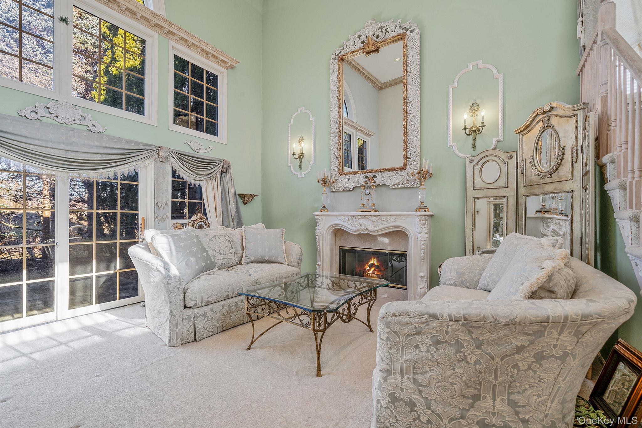 148 Country Club Drive Commack, NY 11725 - Photo 6 of 50 a living room with furniture and a fireplace