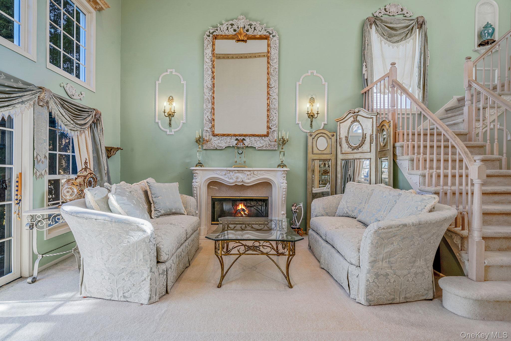 148 Country Club Drive Commack, NY 11725 - Photo 7 of 50 a living room with furniture and a fireplace