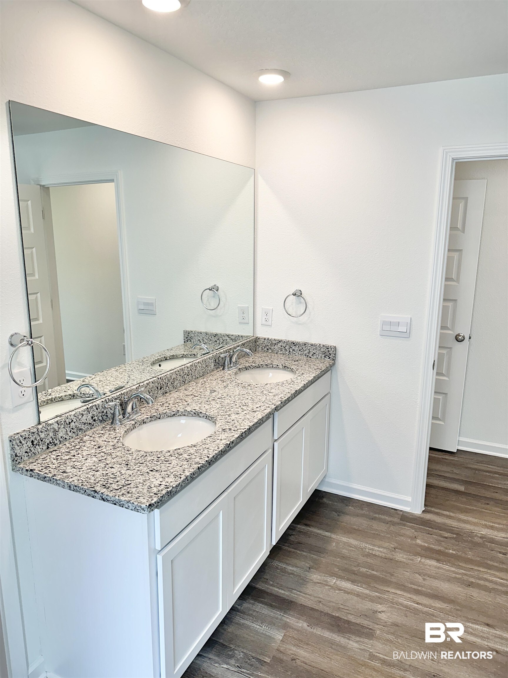 22275 Aleutian Avenue Foley, AL 36535 - Photo 15 of 72 Bathroom featuring wood-type flooring and dual bowl vanity