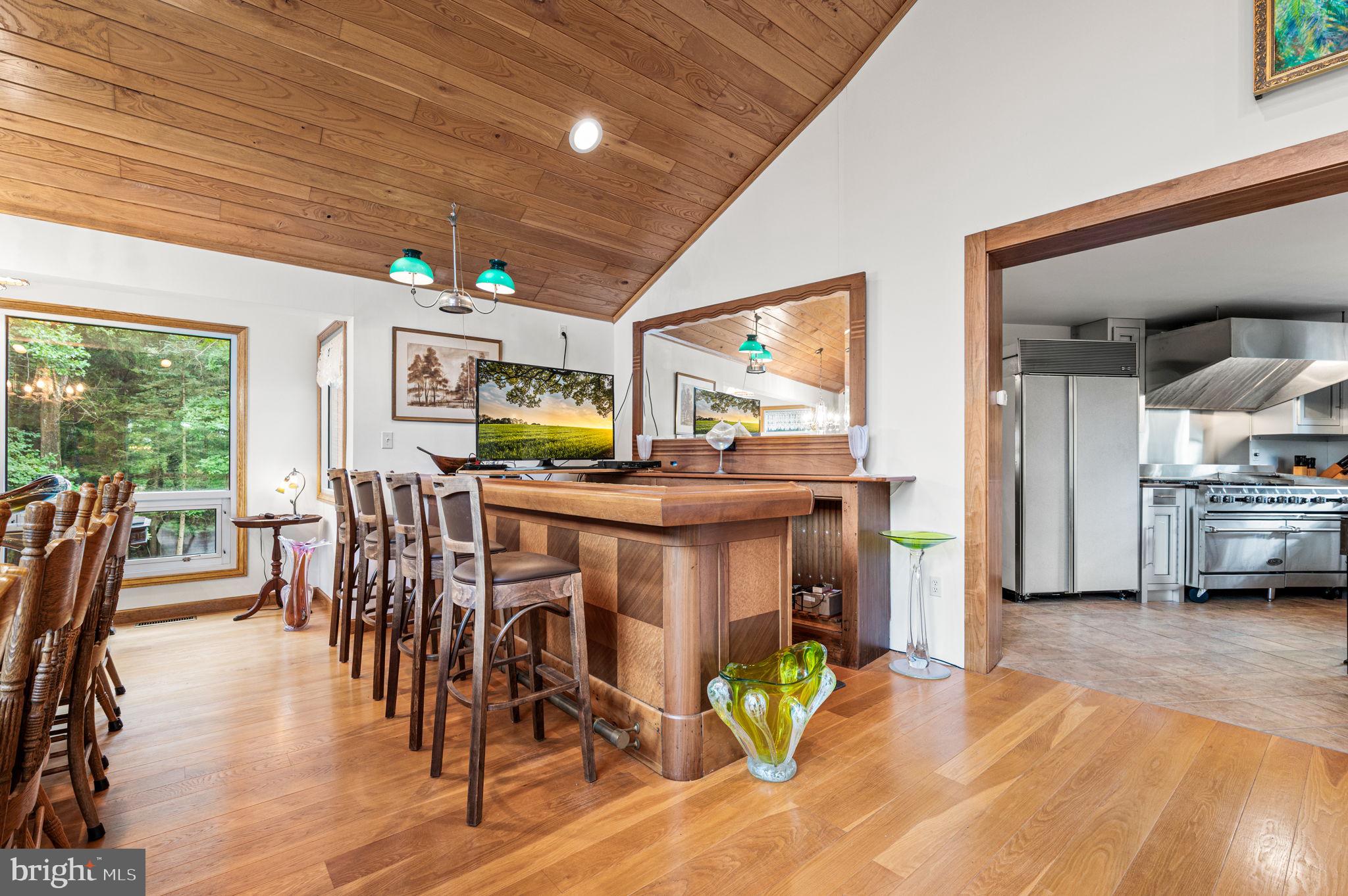38 Lutz Road Boyertown, PA 19512 - Photo 11 of 49 a view of a dining room with furniture and a floor to ceiling window