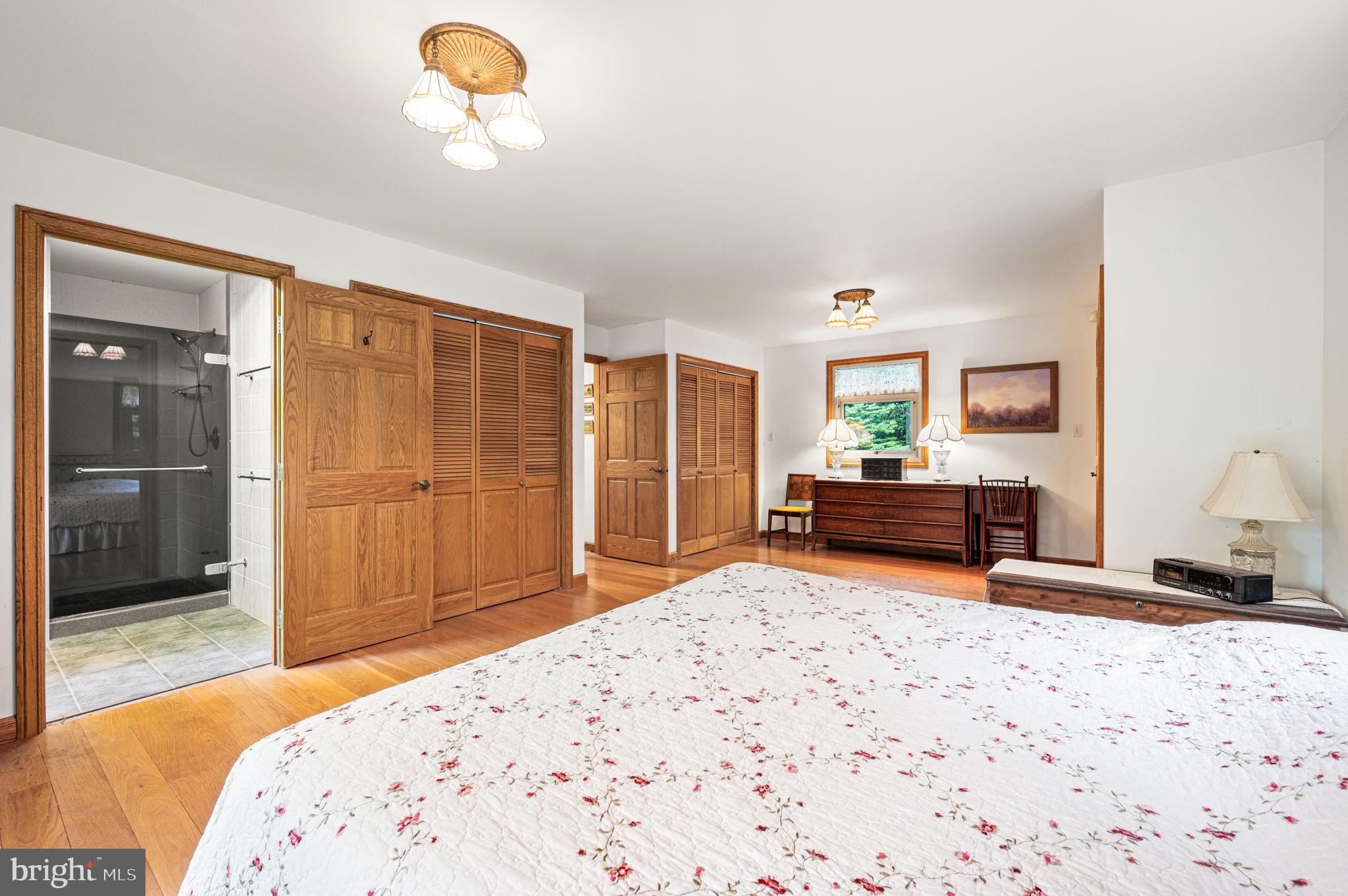 38 Lutz Road Boyertown, PA 19512 - Photo 17 of 49 a bedroom with a bed dresser and a window