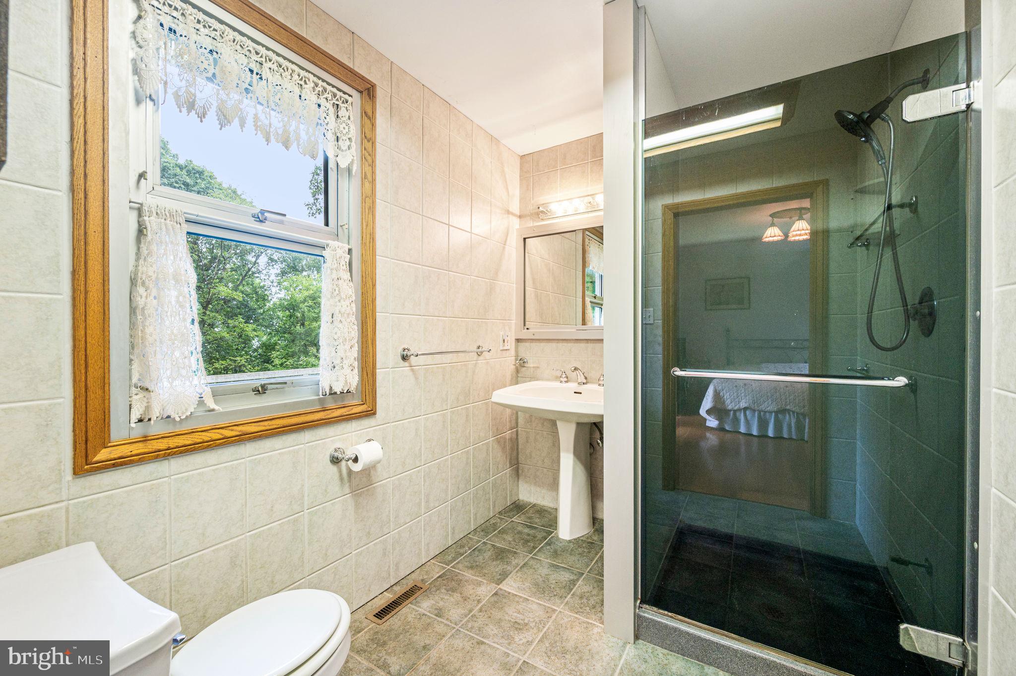 38 Lutz Road Boyertown, PA 19512 - Photo 18 of 49 a bathroom with a shower and toilet