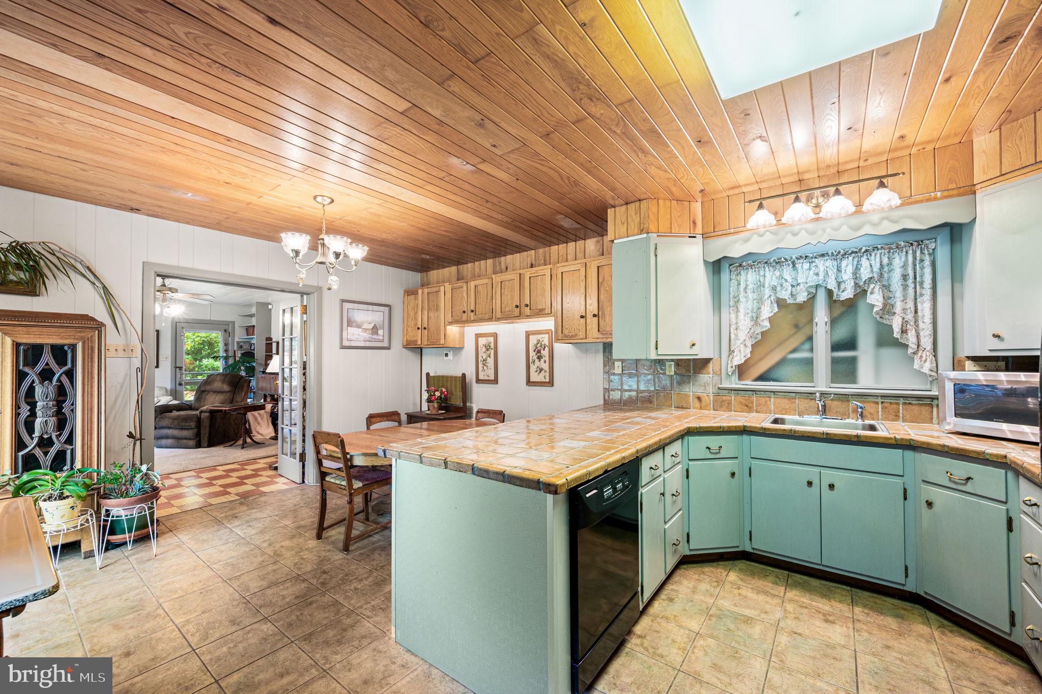 38 Lutz Road Boyertown, PA 19512 - Photo 24 of 49 a kitchen with a sink stove and cabinets