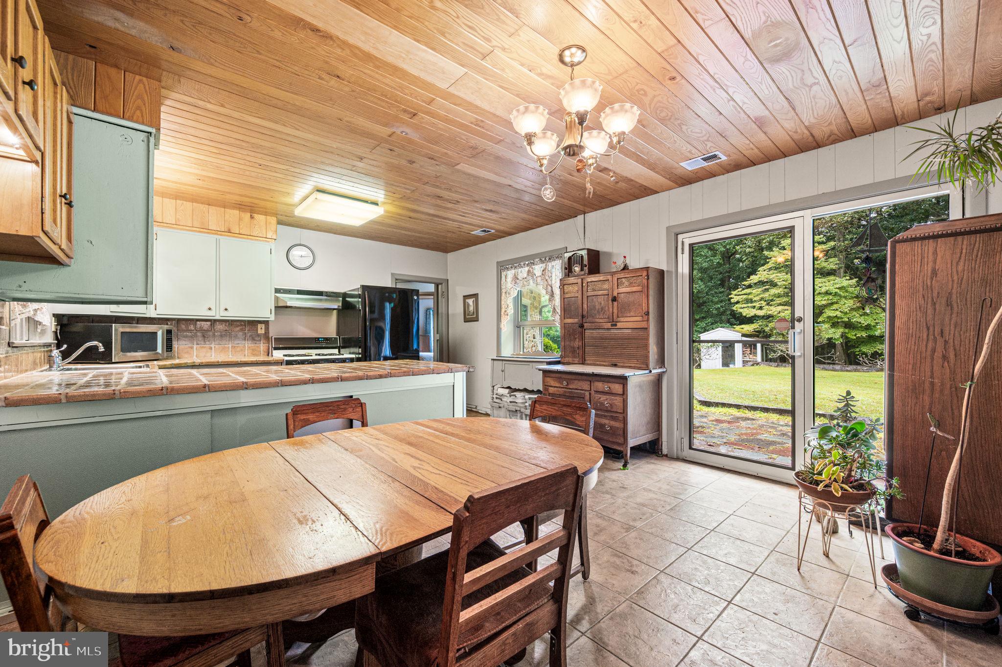 38 Lutz Road Boyertown, PA 19512 - Photo 26 of 49 a large kitchen with a table and chairs