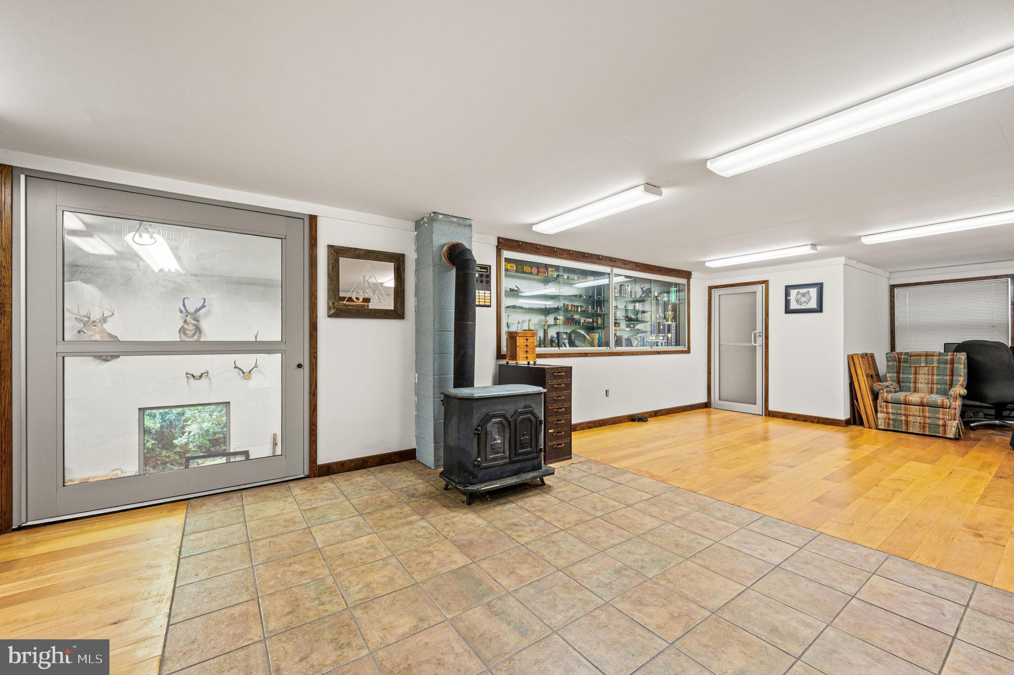 38 Lutz Road Boyertown, PA 19512 - Photo 30 of 49 a living room with furniture and a flat screen tv