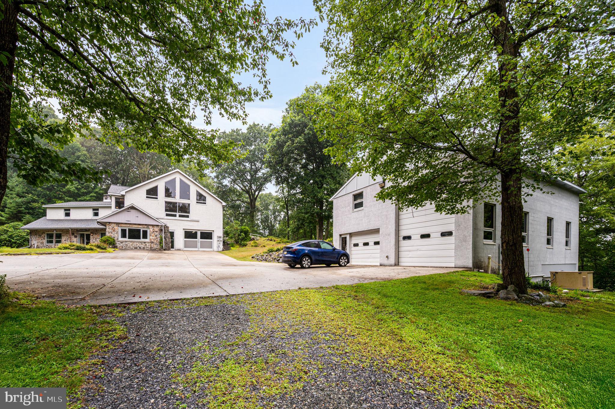 38 Lutz Road Boyertown, PA 19512 - Photo 3 of 49 a front view of a house with garden