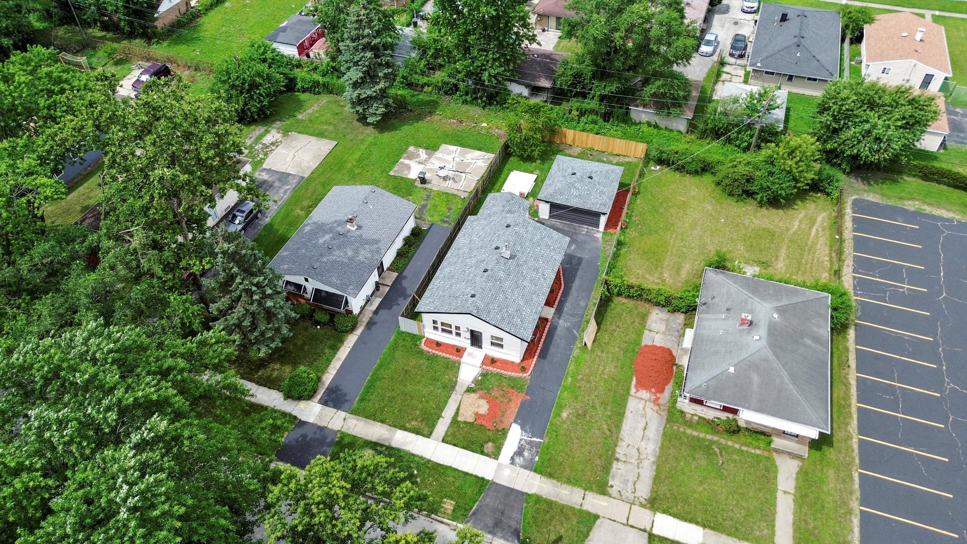 16218 Honore Avenue Markham, IL 60428 - Photo 18 of 25 an aerial view of a house with outdoor space pool seating area and yard