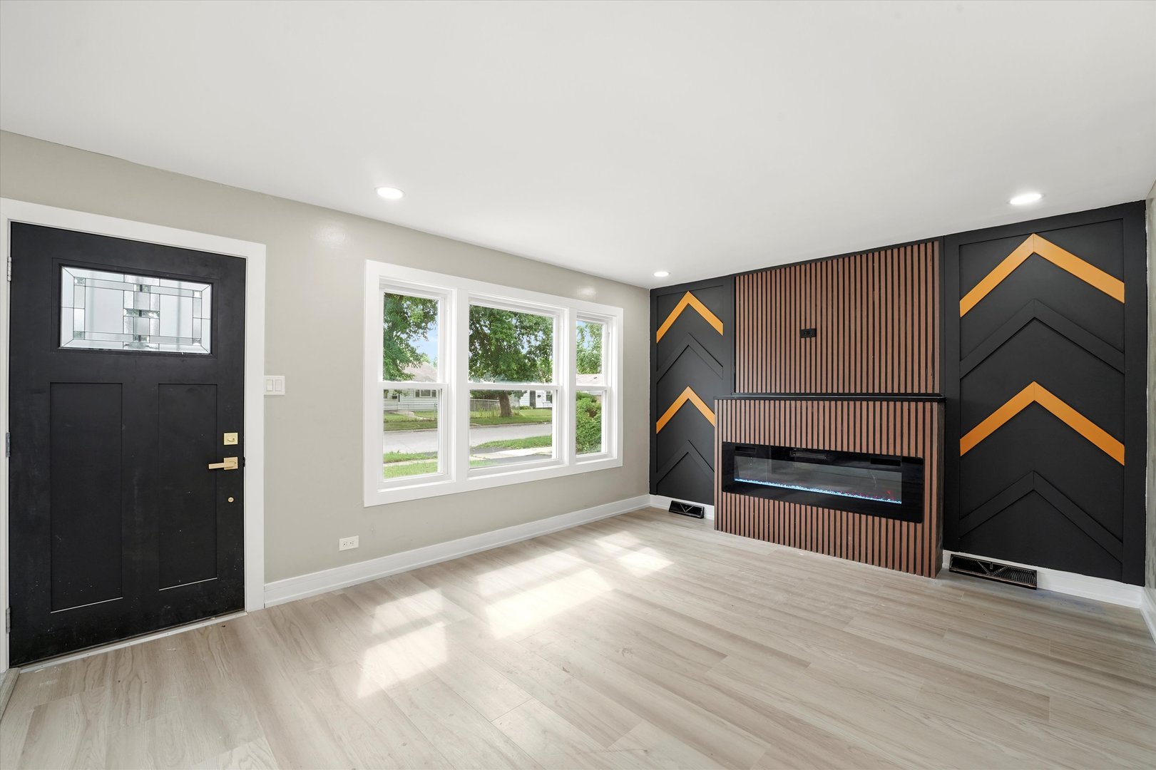 16218 Honore Avenue Markham, IL 60428 - Photo 2 of 25 a bedroom with wooden floor closet and windows