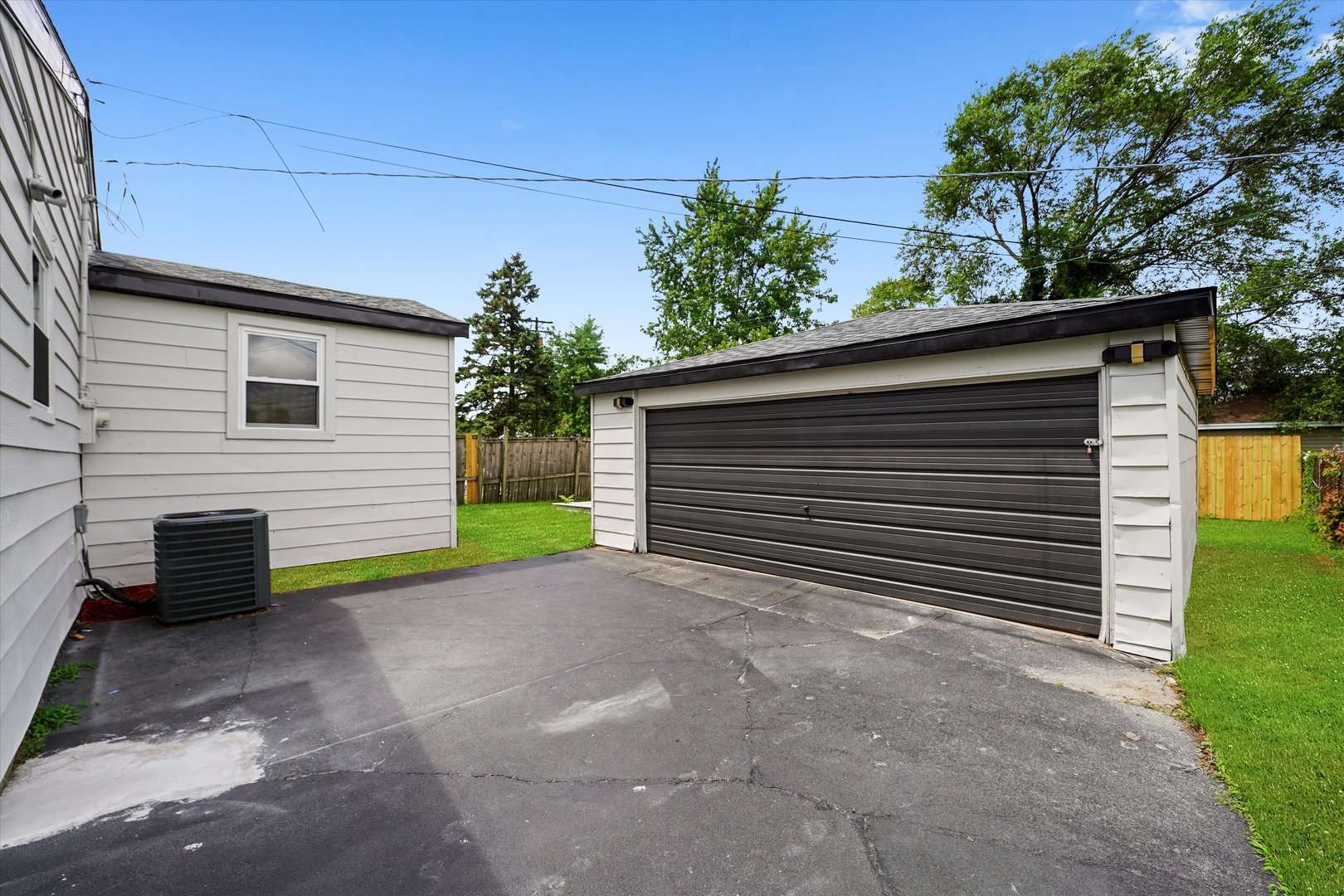 16218 Honore Avenue Markham, IL 60428 - Photo 22 of 25 a view of a back yard of the house