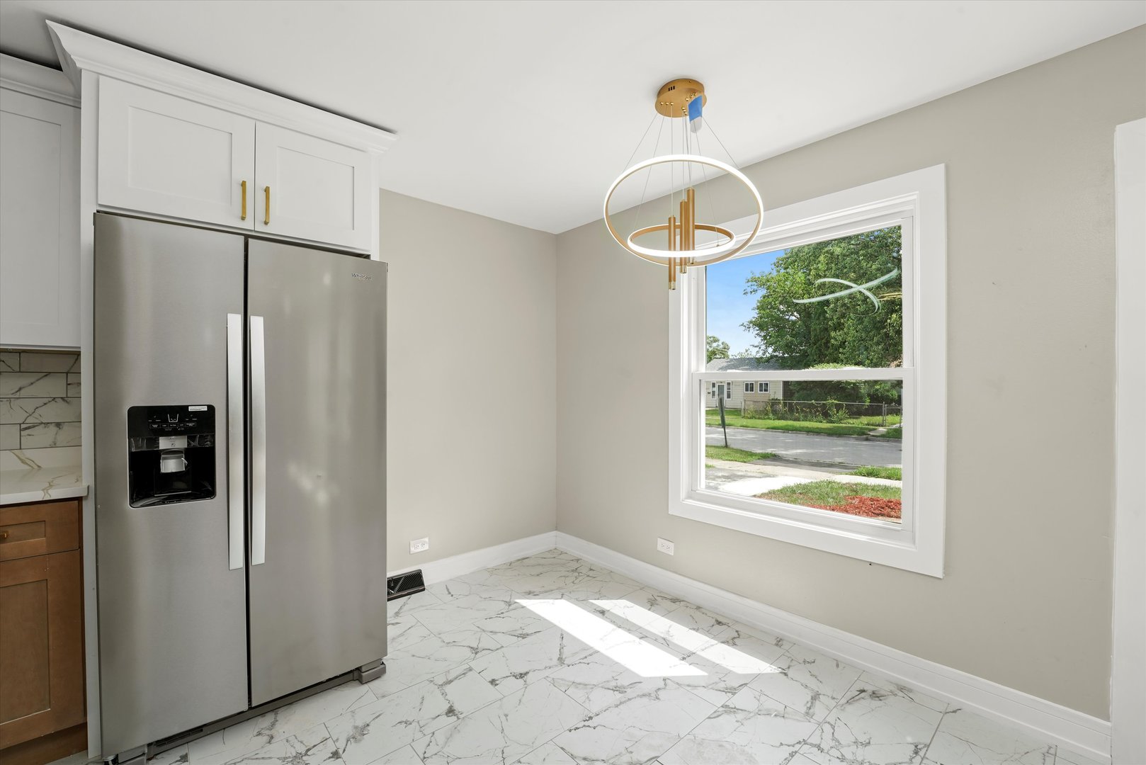 16218 Honore Avenue Markham, IL 60428 - Photo 6 of 25 a front view of a house with windows