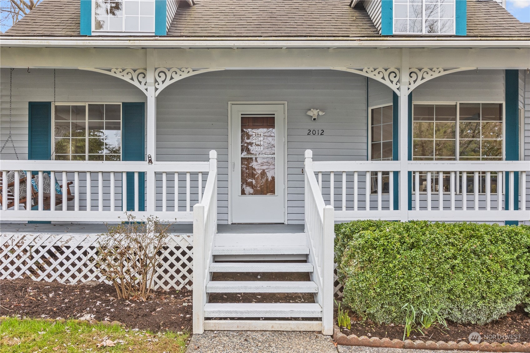 2012 233rd Street Southeast Bothell, WA 98021 - Photo 1 of 39 a front view of a house with a porch