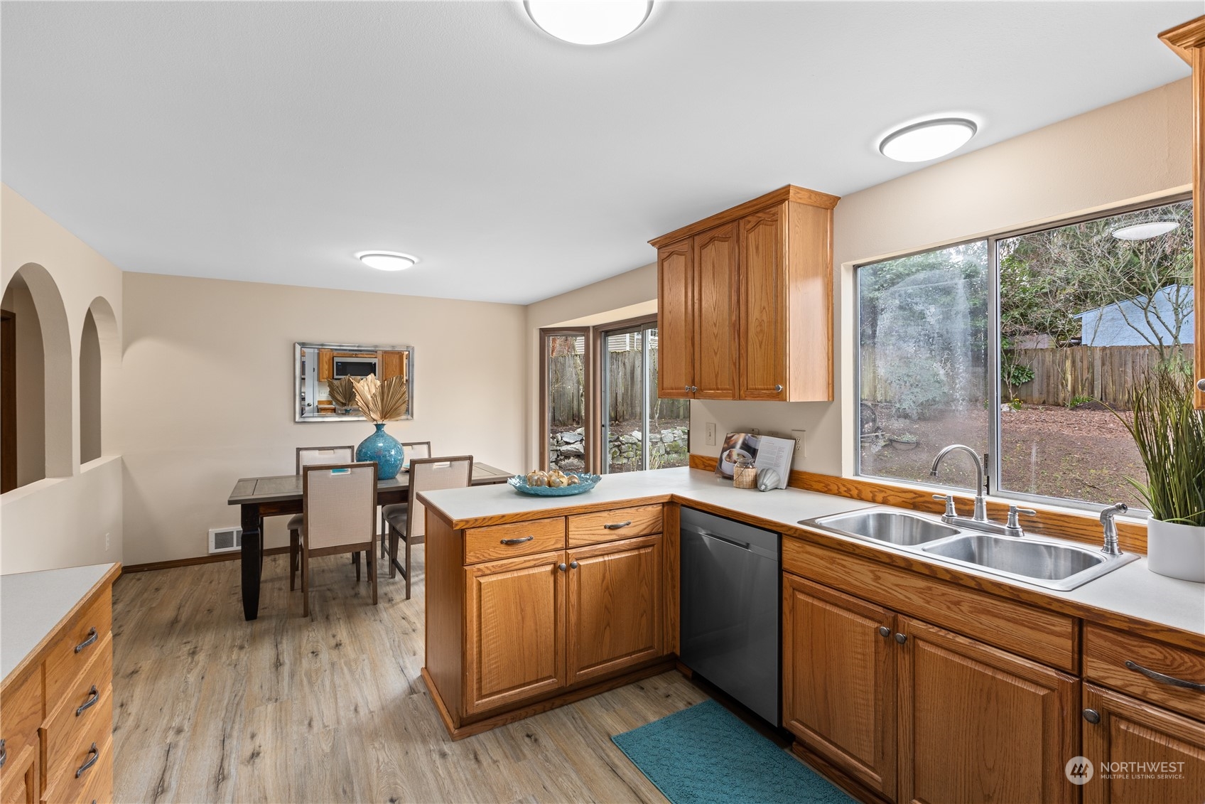 2012 233rd Street Southeast Bothell, WA 98021 - Photo 11 of 39 a kitchen with a sink a counter top space and appliances